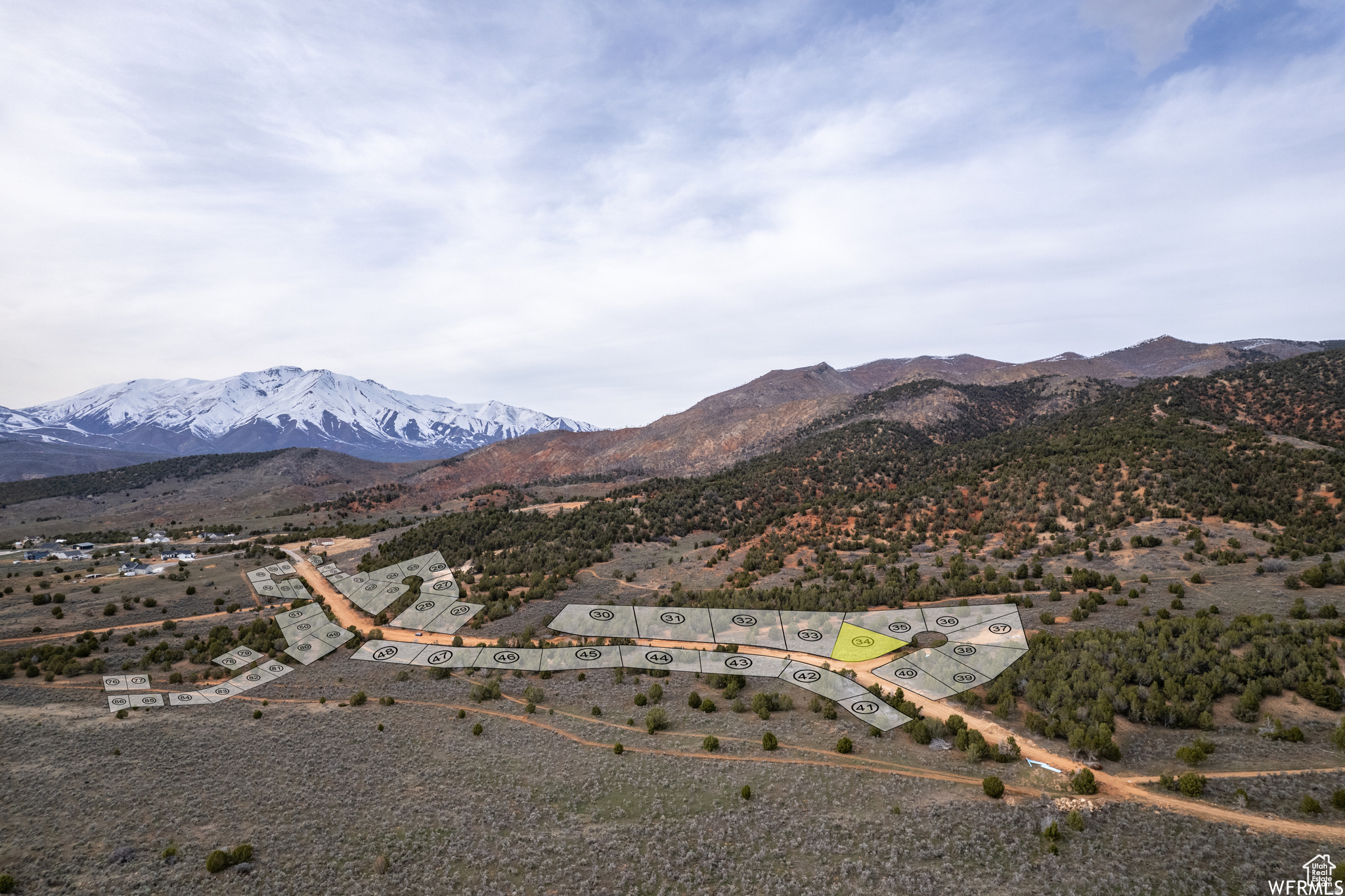 Discover Lot #34 in Eagles Landing - a stunning 1-acre corner cul-de-sac lot nestled behind Loafer Mountain, where the natural terrain shields residents from winter inversions and harsh temperatures. The lot adjoins BLM land and over 200 acres of open space, with a trail system to the east that connects to thousands of square miles of public lands, making it a dream for hikers, mountain bikers, and outdoor enthusiasts. Electricity and water are already stubbed to the lot, giving you a head start on your build. Road work and gas utility installation are both projected to be complete soon, meaning all the infrastructure you need to build your custom dream home will be in place before you know it. For those looking for even more space, Lots 33 and 34 are available to be purchased together - a rare opportunity to secure nearly 2 acres in this sought-after community. Eagles Landing is a self-sustaining community with its own private water source and storage, seamlessly blending rugged natural beauty with modern convenience. Shopping, dining, a hospital, a golf course, and a movie theater are all within 20 minutes. If you've been looking for the perfect lot to build a custom mountain home without sacrificing convenience, Eagles Landing is worth a visit. Schedule your tour today.