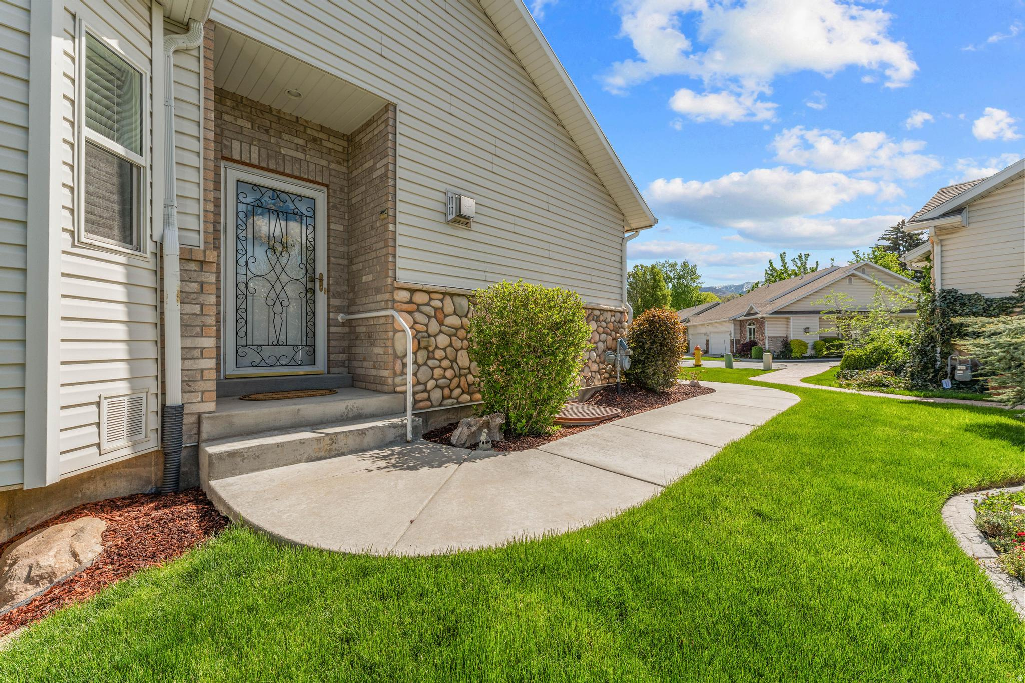 OPEN HOUSE July 25, 11-2** MAIN LEVEL LIVING** Centrally located within walking distance to shopping and restaurants. Come tour this beautiful and charming cottage style rambler on quiet cut-de-sac. This spacious twin home features an inviting formal living room with fireplace and large dining area with custom built in oak buffet. Beautiful oak cabinets in kitchen, high end laminate flooring and **BRAND NEW CARPET**give this home classic finishes and is **MOVE IN READY!**!  Spacious main floor bedroom is finished with crown molding and uplighting. Main Bath has lots of counter space,  bathtub and separate shower and large walk in closet. Both upstairs bedrooms open onto private porch with gas outlet for BBQ. Guest half bath has new vanity with quartz countertop and laundry room are both on main floor. Walk out basement with huge family room, 2 large bedrooms, I full bath with quartz countertop  and a ** 5TH BEDROOM JUST WATING TO BE FINISHED TO MAKE THIS A 5 BEDROOM HOME**. Basement opens unto covered patio and partially fenced back yard. HOA maintains your beautiful yard so no mowing required. **SAFE, SPACE HEATER AND TV'S ARE INCLUDED!**    Buyer is advised to obtain independent measurements and verify all information.