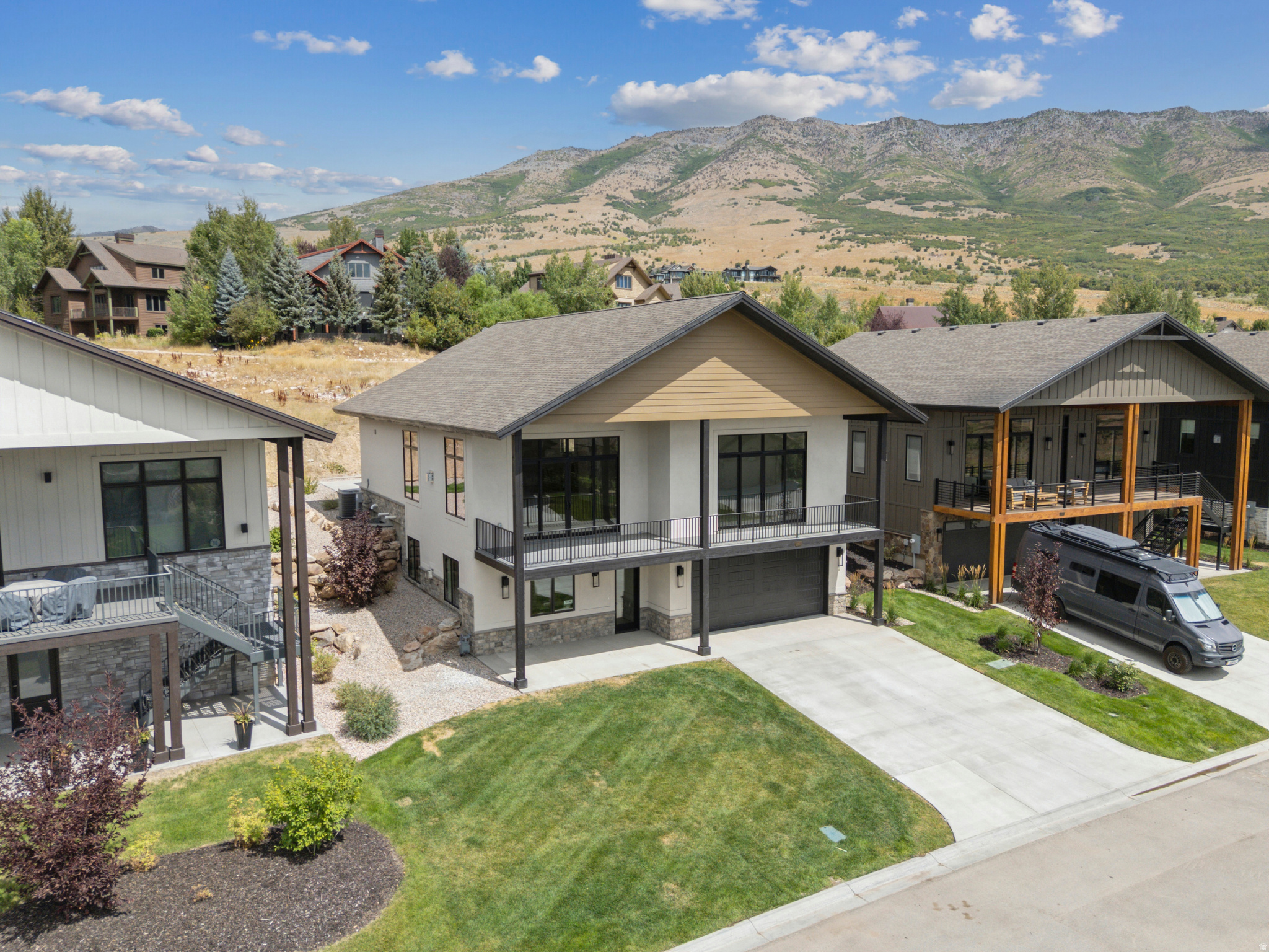 ***Brand new, recently completed! Trappers Ridge's newest floor plan... Soaring vaulted ceilings, expansive windows and sliding glass doors. Breathtaking views of Pineview Reservoir, Snowbasin and the entire valley.  ***Two family gathering rooms, 6 bedrooms, 6 bathrooms, exterior deck off the front providing views overlooking the valley and private hot tub off the back patio.  ***Trappers Ridge offers a convenient, low-maintenance lifestyle with individual free-standing homes. Commuity amenities include a spacious clubhouse with ping pong, fitness room, swimming pool, hot tub, walking trails and basketball, tennis/pickleball courts. ***The perfect setting for a full time resident, vacation home get away, or investment property offering short term rental options.  ***Call today to schedule your private tour or check out our next scheduled Open House.
