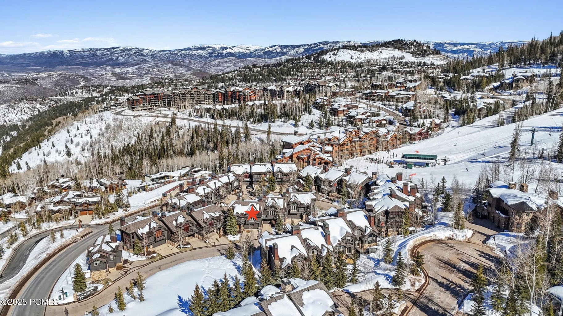 Unmatched Empire Pass location just steps from the Northside Express chairlift! This exceptional Ironwood townhome places you in the heart of Deer Valley's coveted Empire Pass, providing effortless access to world-class skiing and year-round mountain recreation, including several nearby hiking and biking trails. Thoughtfully designed for comfort and entertaining, the residence features four spacious bedroom suites, inviting gathering areas, and beautifully appointed living spaces that capture the warmth and elegance of mountain living. Expansive windows frame the surrounding mountain landscape, while the open great room and gourmet kitchen create the ideal setting for hosting family and friends. Step outside to enjoy the peaceful alpine setting from your private hot tub, perfect for relaxing after a day on the slopes! A large two-car garage provides ample storage for mountain gear. The home is located just minutes from Silver Lake Village for convenient access to dining, shopping, and additional resort amenities. Offering premier ski access, timeless mountain design, and strong rental potential, Ironwood 22 is a rare opportunity in one of Deer Valley's most exceptional locations.
