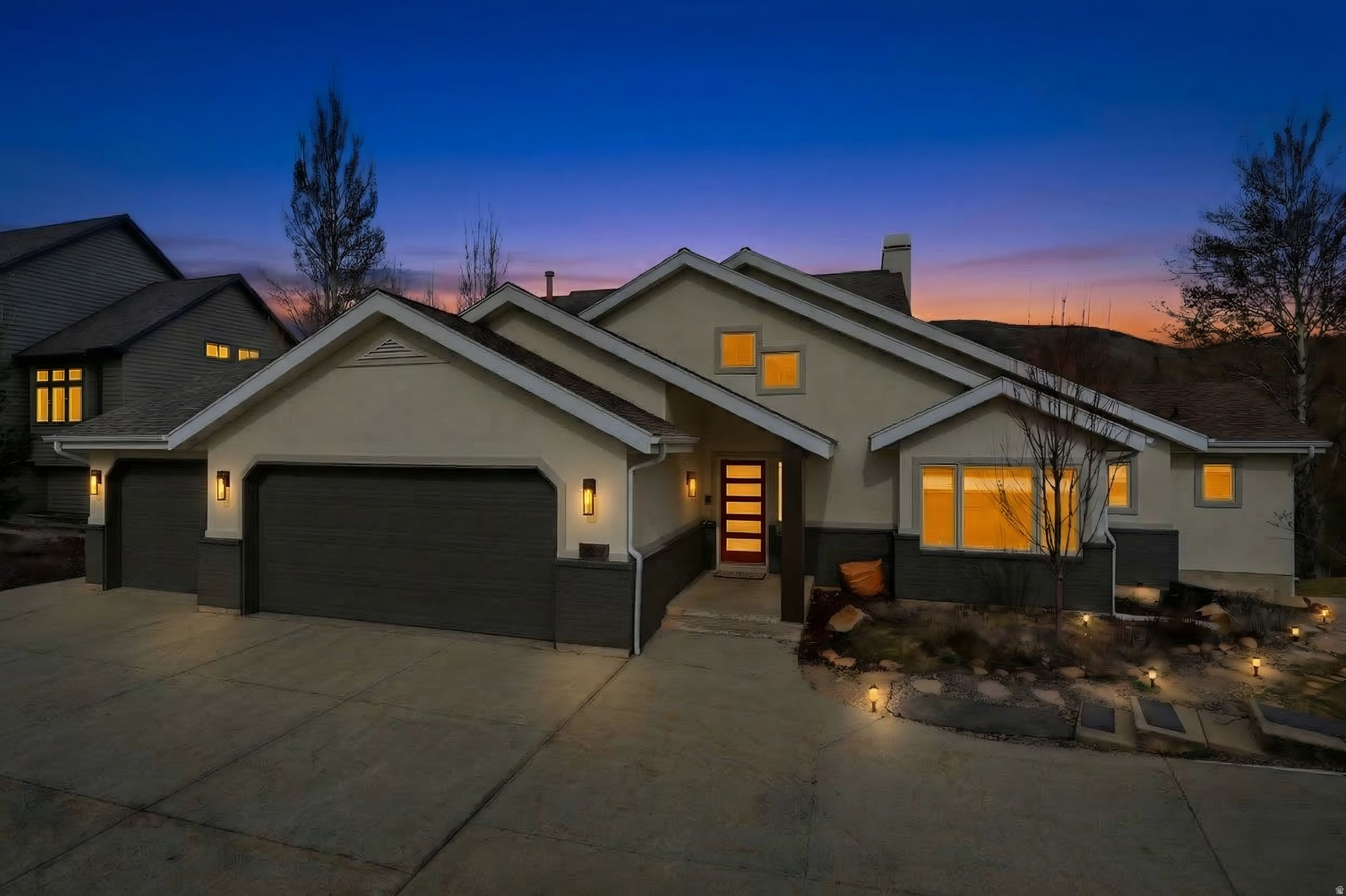 Perched above the fairways in the heart of Jeremy Ranch, this beautifully remodeled home offers sweeping mountain and golf course views, generous living spaces, and a layout designed for comfort and entertaining. Situated on a rare .43-acre lot with a flat, grassy yard, the property overlooks the golf course, stream, and pond below, providing a serene, ever-changing backdrop with seasonal privacy and openness. Thoughtfully updated, the home blends modern upgrades with timeless mountain style. The main-level living features a spacious great room with one of the home's three fireplaces, flowing seamlessly to the chef's kitchen, ideal for entertaining or everyday life. Windows throughout frame the views and fill the home with natural light. The primary suite on the main level offers a private retreat with its own fireplace and a spa-like ensuite with heated floors. Upstairs, three bedrooms share a Jack-and-Jill bath, while the lower level adds two large bedrooms, a full bath with heated floors, and a spacious family/game room, perfect for movies, recreation, or hosting guests. Outdoor living is a highlight, with a generous view deck and lower patio providing dual spaces to enjoy the golf course and mountain vistas--perfect for dining, entertaining, or relaxing. An oversized three-car garage completes the home with ample storage. Located in the highly desirable Jeremy Ranch community, residents enjoy nearby hiking and biking trails, golf, and access to the expansive 910 Ranch, all with an easy commute to Salt Lake City and just minutes from world-class skiing, dining, and recreation.