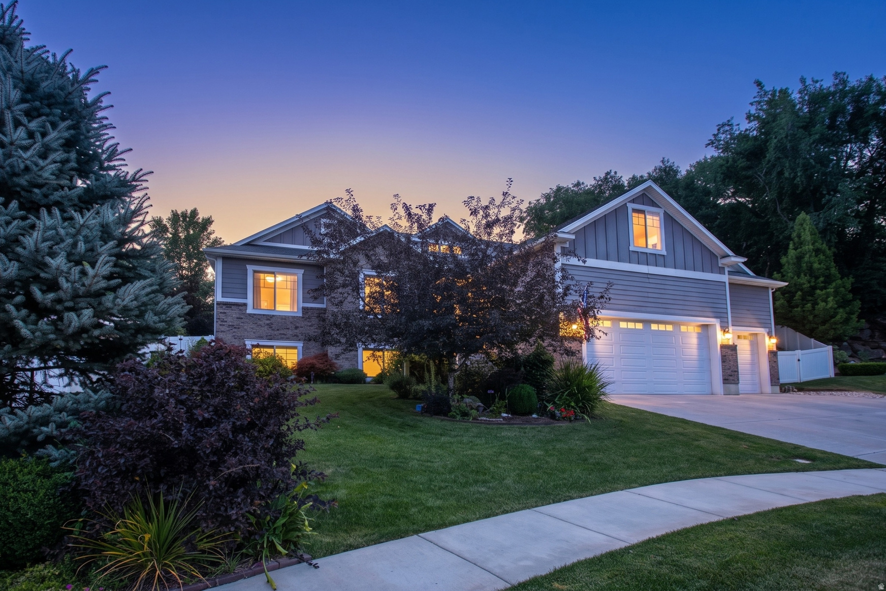 Step into this stunning Farmington luxury home featuring a beautifully upgraded mother-in-law apartment-currently rented for $3,000/month! Truly better than new, this immaculate residence welcomes you with soaring two-story ceilings in the entry and family room that will take your breath away. The main floor boasts a gorgeous primary suite with a spa-like executive bath, plus two additional spacious bedrooms. A versatile loft provides the perfect space for an office, playroom, or second family room. The gourmet kitchen is a chef's dream-bright, open, and ideal for entertaining. The private mother-in-law apartment mirrors the same level of quality, offering abundant natural light, three spacious bedrooms, a stunning kitchen/family room, and its own private entrances. Outdoors, you'll love the manicured grounds, colorful landscaping, and a private covered patio-perfect for gatherings or quiet relaxation. A spacious four-car garage with built-in shelving provides plenty of room for cars, toys, and storage. Tucked away on a peaceful cul-de-sac surrounded by beautiful neighboring homes, this property feels serene yet is just minutes from shopping, freeway access, Salt Lake City, Ogden, and the airport. Lovingly cared for by its original owner, this home checks every box-luxury, functionality, and value. Motivated sellers-don't miss this dream home!