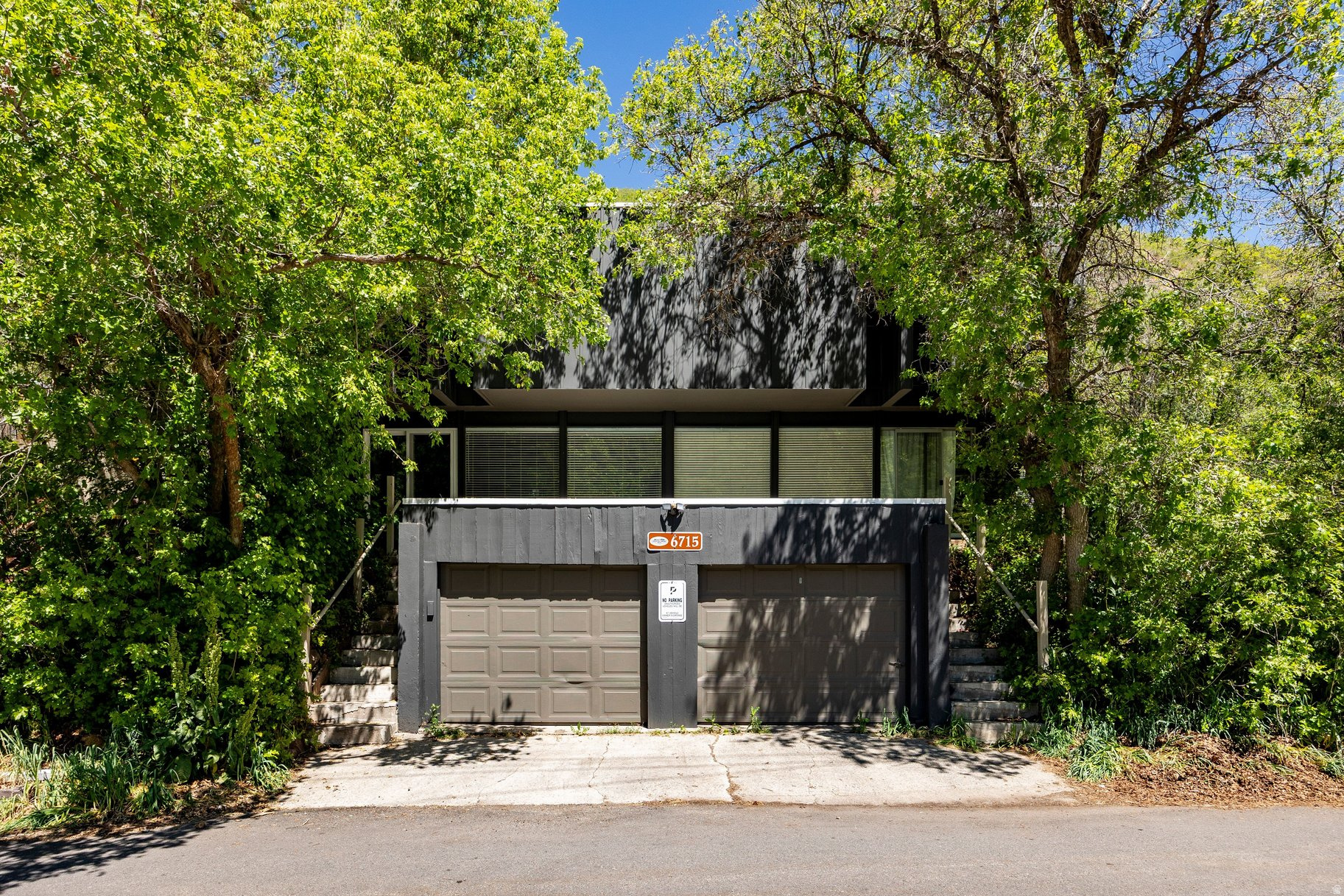 Opportunities like this tend to reveal their value over time. What feels like a considered investment today often becomes, in hindsight, the decision you're most grateful you made. Offered here is a rare chance to own a thoughtfully situated duplex in Emigration Canyon -- an area where demand is driven as much by feeling as it is by location. Surrounded by scrub oaks and the quiet pace of nature, this mid-century property offers a living experience that continues to resonate deeply with renters seeking something beyond the ordinary.Properties like this don't rely on trends -- they endure. And in a market where lifestyle-driven locations hold their value, this is an opportunity to invest in both place and longevity. If you'd like more information or to explore the property further, I'd be happy to connect. A drive-by offers a sense of the setting -- just a short, scenic route up the canyon from Salt Lake, or under 20 minutes from Summit Park.Kindly respect the tenants' privacy and do not disturb.