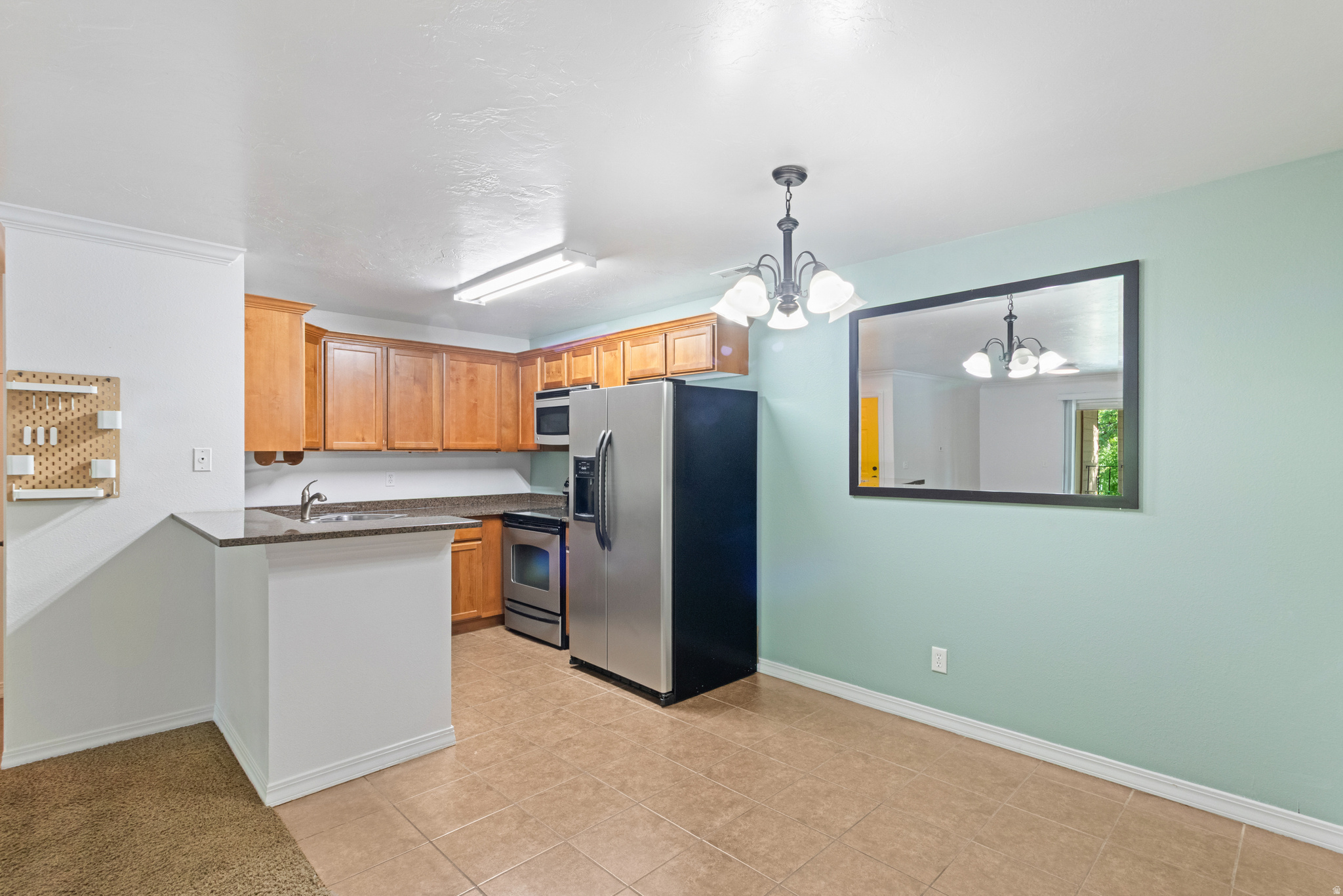 Top-floor living in one of the valley's most convenient locations! Turnkey, with all appliances included. Nestled in the heart of Millcreek, this condo offers quick access to downtown Salt Lake City, I-15, I-215, and the Cottonwood Canyons, making work, dining, and outdoor adventure all within easy reach. Enjoy the convenience of nearby restaurants and entertainment while living in a peaceful setting tucked away from busy streets. With mountain views and no neighbors above, this home offers comfort, privacy, and location all in one.