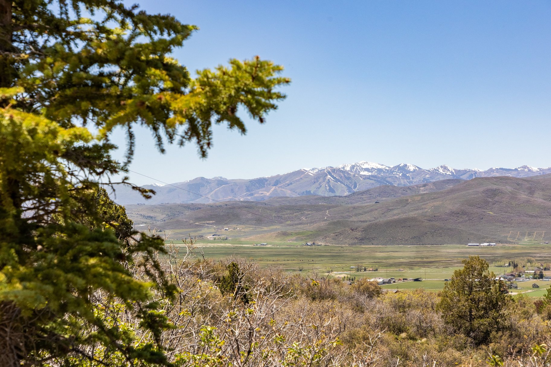 Build your dream property in the gorgeous Kamas Valley on these gradual slope lots with exceptional West facing views of the ski areas of Park City Mountain, Deer Valley, Mt Timpanogos, Kamas Valley and beyond.These are two buildable lots being sold together allowing for exceptional optionality to build your home, guest home and accessory structures.With amazing proximity to the main entrance for Kamas East, this property is also situated only 15 minutes to the new Deer Valley East Village for world class skiing, minutes from amazing snowmobiling, hiking, mountain biking and equestrian trails and the 2 million acres of the Uinta National Forest. Enjoy fly fishing on the Provo & Weber rivers, and water sports via the Jordanelle reservoir, along with direct access to UTV and snowmobile trails from this subdivision. The property conveys with a water right from Weber Basin.