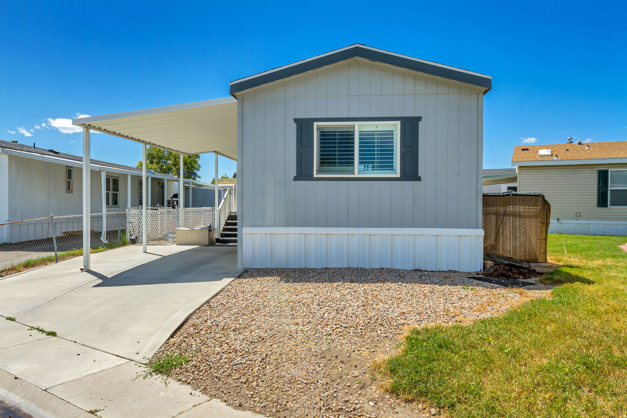 ***GRAND OPEN HOUSE, SATURDAY MAY 30TH 11AM-1PM*** Charming and very well-maintained manufactured home featuring 2 bedrooms and 2 bathrooms with a bright and functional layout! This home has been lovingly cared for and offers an open-concept kitchen and living room, perfect for entertaining or everyday living. Enjoy durable LVP flooring throughout, a gas range that is only 2 years old, and a brand-new roof for added peace of mind.  Square footage figures are provided as a courtesy estimate only.  Buyer is advised to obtain an independent measurement.