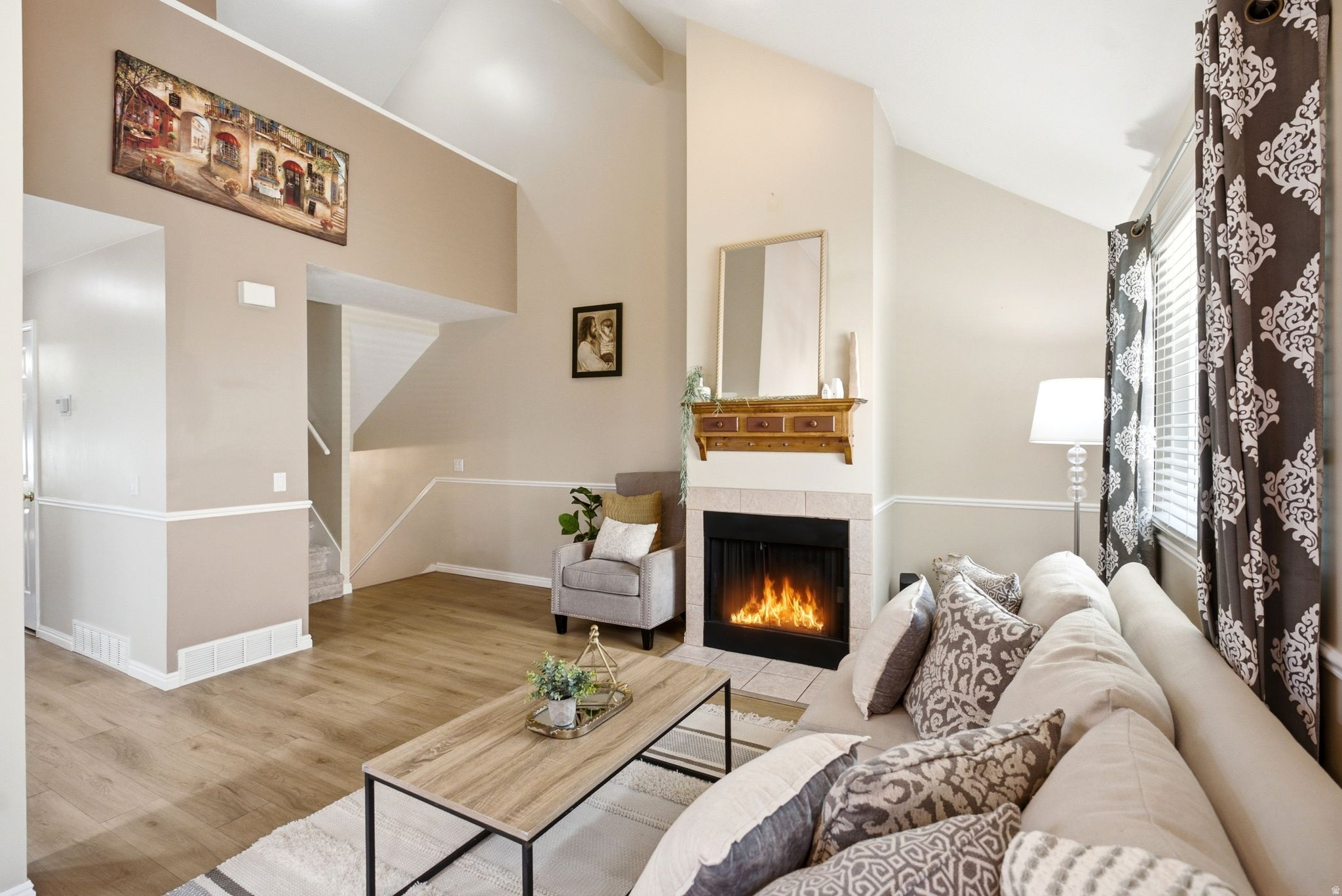 **Open House - Saturday from 2-4pm** __ Classy, clean, and convenient! Pride of ownership shines throughout this beautifully maintained Val Verda townhome featuring vaulted ceilings, a bright loft, cozy fireplace, and a flexible, functional layout. The newly remodeled kitchen boasts brand-new cabinets, LVP flooring, and all-new appliances. The layout offers two potential primary suites, with a bedroom and full bath on the main level and a spacious owner's suite with an adjoining bath upstairs. The finished lower level includes a large family room and a den/home office that could also be used as a fitness space or potential third bedroom. A spacious bathroom/laundry combo features a deep laundry sink, and the washer and dryer are included. Let's not forget the new water heater! Step outside to a newly built composite deck overlooking a cute, private backyard. This one is all about location, location, location! Situated between Salt Lake City and Ogden, with easy access to downtown Salt Lake City, the SLC airport, hiking trails, and the 455/470 bus routes, you can conveniently get wherever you need to go. Enjoy low-maintenance living with landscaping, snow removal, water, sewer, and trash covered by the HOA.