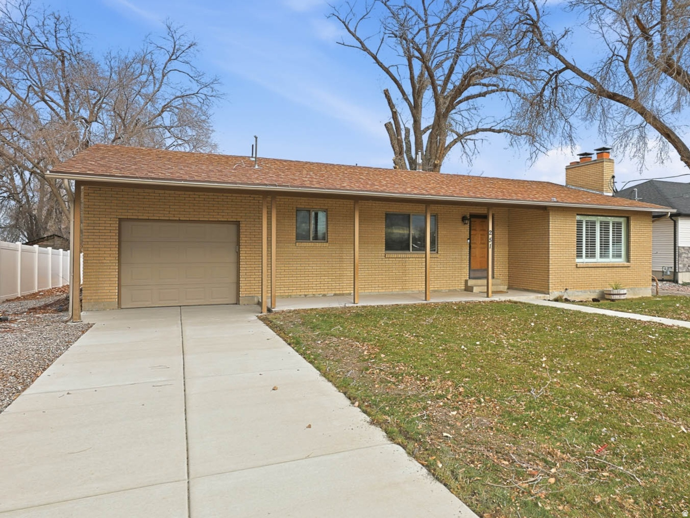 Seller to contribute $15,000 towards Buyers closing cost. Welcome home to this beautifully updated ranch-style rambler offering comfortable main floor living with space to spread out. Upon entry, you're greeted by a cozy front living room highlighted by a gas fireplace, perfect for relaxing evenings. The heart of the home is the fully remodeled kitchen, featuring upgraded appliances, modern finishes, and plenty of space for entertaining. The main floor offers three spacious bedrooms and two updated bathrooms, including a primary suite with a dual-vanity sink, separate soaking tub, and walk-in shower. Convenient main-floor laundry adds to the home's functionality. Downstairs, enjoy a versatile family or game room with a charming wood-burning fireplace, an additional flex or bonus room, and one more bedroom, perfect for guests, a home office, or extra living space. Step outside to a private backyard with a covered patio, ideal for summer gatherings and outdoor enjoyment. With plenty of RV parking. Located close to schools and the center of town, this home offers the perfect blend of comfort, upgrades, and convenience.