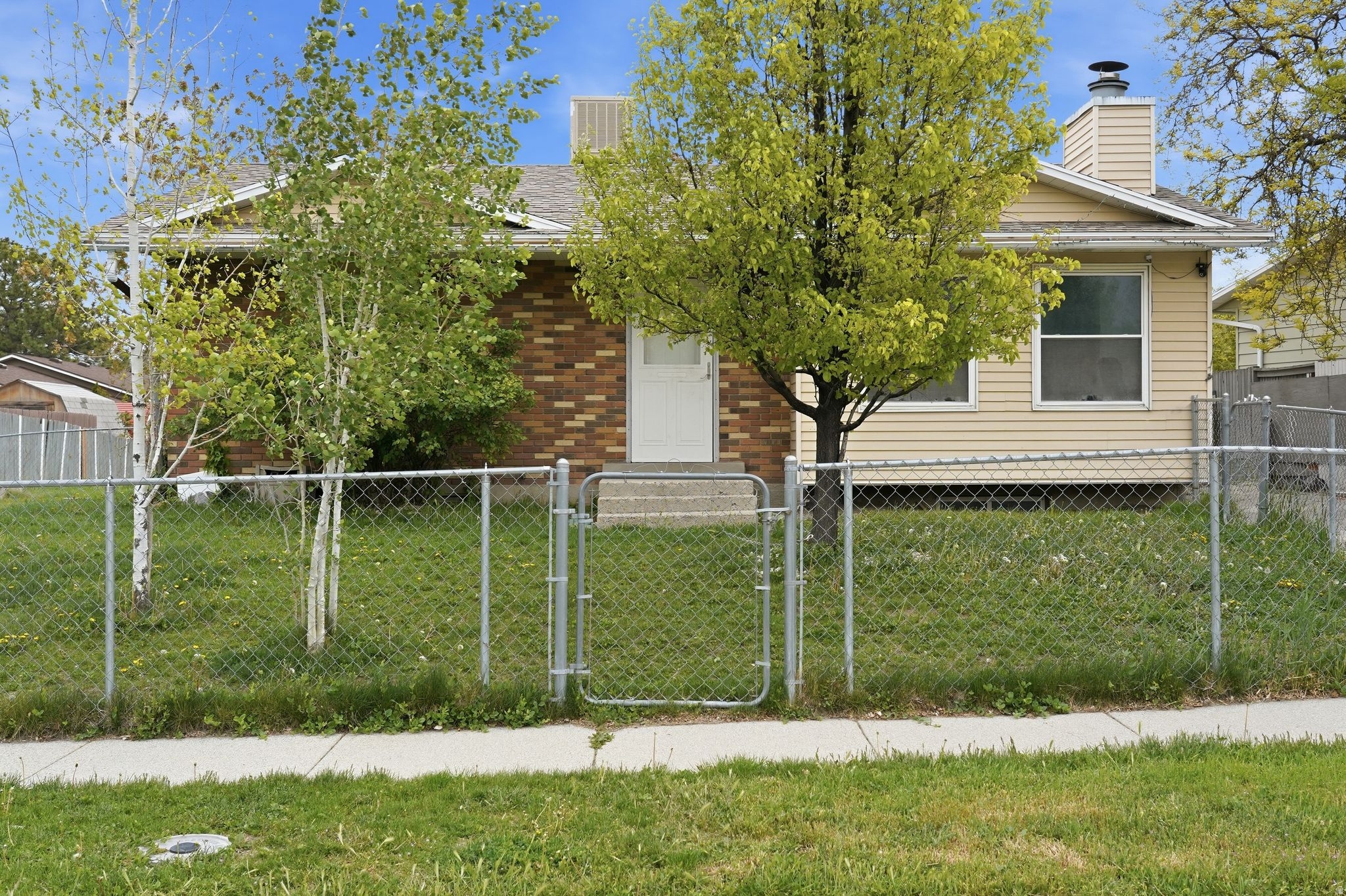 Amazing opportunity for owner-occupants or investors! This well-maintained home offers excellent rental income potential with a fully finished basement featuring a separate walkout entrance, its own kitchen, and two spacious bedrooms with walk-in closet-ideal for multi-generational living or rental income. The main level showcases an updated kitchen with a modern island, updated cabinetry, and refreshed bathroom upgrades. Recent improvements include a newer roof, central air system, water softener, updated lighting, and new carpet in the bedrooms-making this home truly move-in ready. Enjoy outdoor living with a brand-new, oversized deck-perfect for entertaining or relaxing. Located in a great neighborhood just steps from a park and elementary school, this property offers both convenience and lifestyle. Easy access to shopping, dining, and commuting routes. Don't miss this versatile property with strong income potential and long-term value!