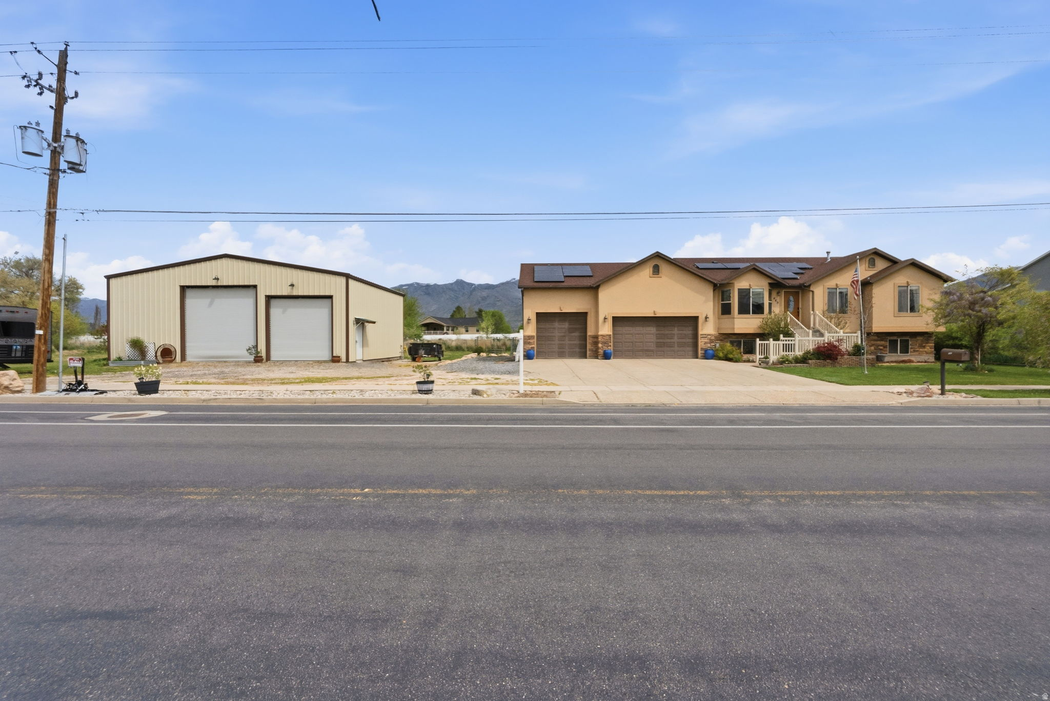 View VIDEO! Over 2200 SQ FT of garage/workshop space, could you own any more toys! Got a horse, room for that too! Heated WORKSHOP is 1440 Sq ft with 14 ft &12 ft tall doors. Plenty of room for your toys and RV. This well-maintained 4-bdrm, 4 bath home has Solar panels and vaulted ceilings, tons of cabinetry, large bar and plenty of storage throughout. Enjoy your Master Suite with large soaking tub, shower, his/hers sinks and walk in closet. The fully finished basement can be used as a Mother-in-law suite with a kitchen, separate entrance, 2 bedrooms and 2 bathrooms. Seller will pay off Solar at closing with full price offer. Priced per recent appraisal. Use Aligned showing to schedule.