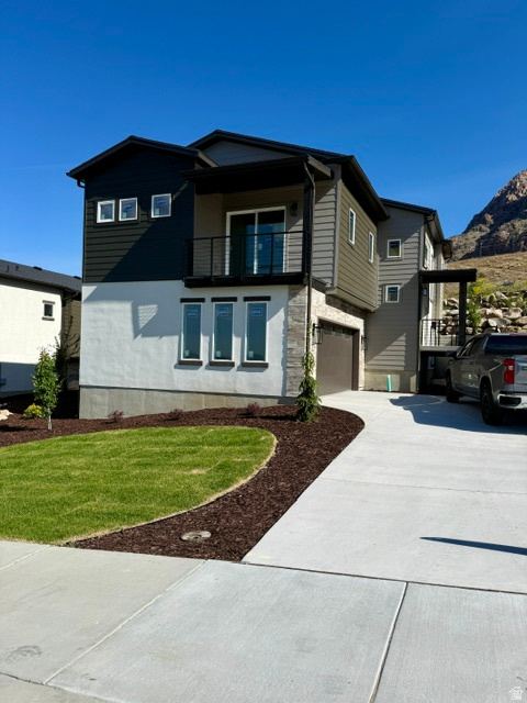 Welcome to your dream home in the new Valley View subdivision nestled on Ogden picturesque east bench, with NO BACKYARD NEIGHBORS offering the perfect blend of modern luxury and outdoor adventure. Our 2 story XL plan features a larger kitchen area and is custom built to boast breathtaking panoramic views and provide direct access to scenic hiking trails, inviting you to embrace the beauty of nature right outside your doorstep. Upgrades and views everywhere you look! The sleek kitchen is a chef's delight, equipped with premium appliances, stylish cabinetry and ample counter space flowing into the the main living area with tons of natural light and a bonus deck with mountain views. A walk-in closet in the master with a separate soaking tub and balcony. Absolutely must see. Special lender incentives include $5000 towards closing costs and a 4.5% ARM or fixed 5.25%.