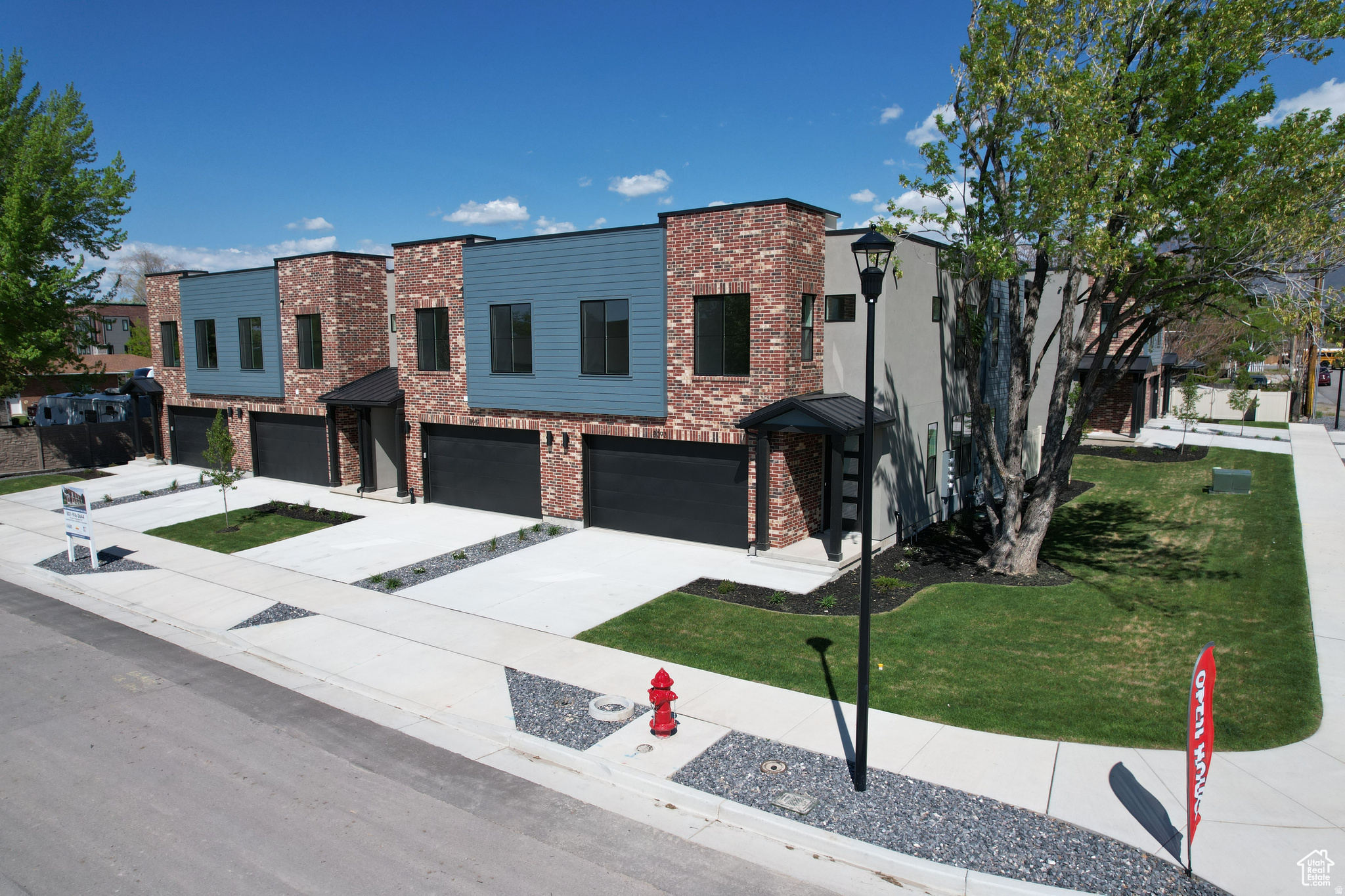 Welcome to this exceptional townhome nestled in Sandy, Utah. Boasting premium finishes, ample natural light, and an open-concept layout, this townhome is designed to blend contemporary style with functional living. Equipped with GE Profile appliances, including a gas range and range hood, this kitchen is a chef's dream. Elegant cabinetry, sleek countertops, and a spacious layout make cooking and entertaining a delight. The spacious master suite features a large walk-in closet and a luxurious four-piece bathroom and a covered balcony with breathtaking views of the surrounding mountains; the perfect spot to enjoy a morning coffee or unwind in the evening. Two large secondary bedrooms, each with a walk-in closet, offer ample space for family, guests, or a home office. The unfinished basement provides endless possibilities-add a family room, extra bedroom, and bathroom to suit your lifestyle needs and maximize your living space. This modern townhome is ideally located in a quiet neighborhood, and is just minutes from shopping, dining, and outdoor recreation, with quick access to major highways and the stunning Wasatch Mountains. Whether you're entertaining guests, relaxing in your master retreat, or envisioning future upgrades in the basement, this townhome offers the ideal canvas for your next chapter.
