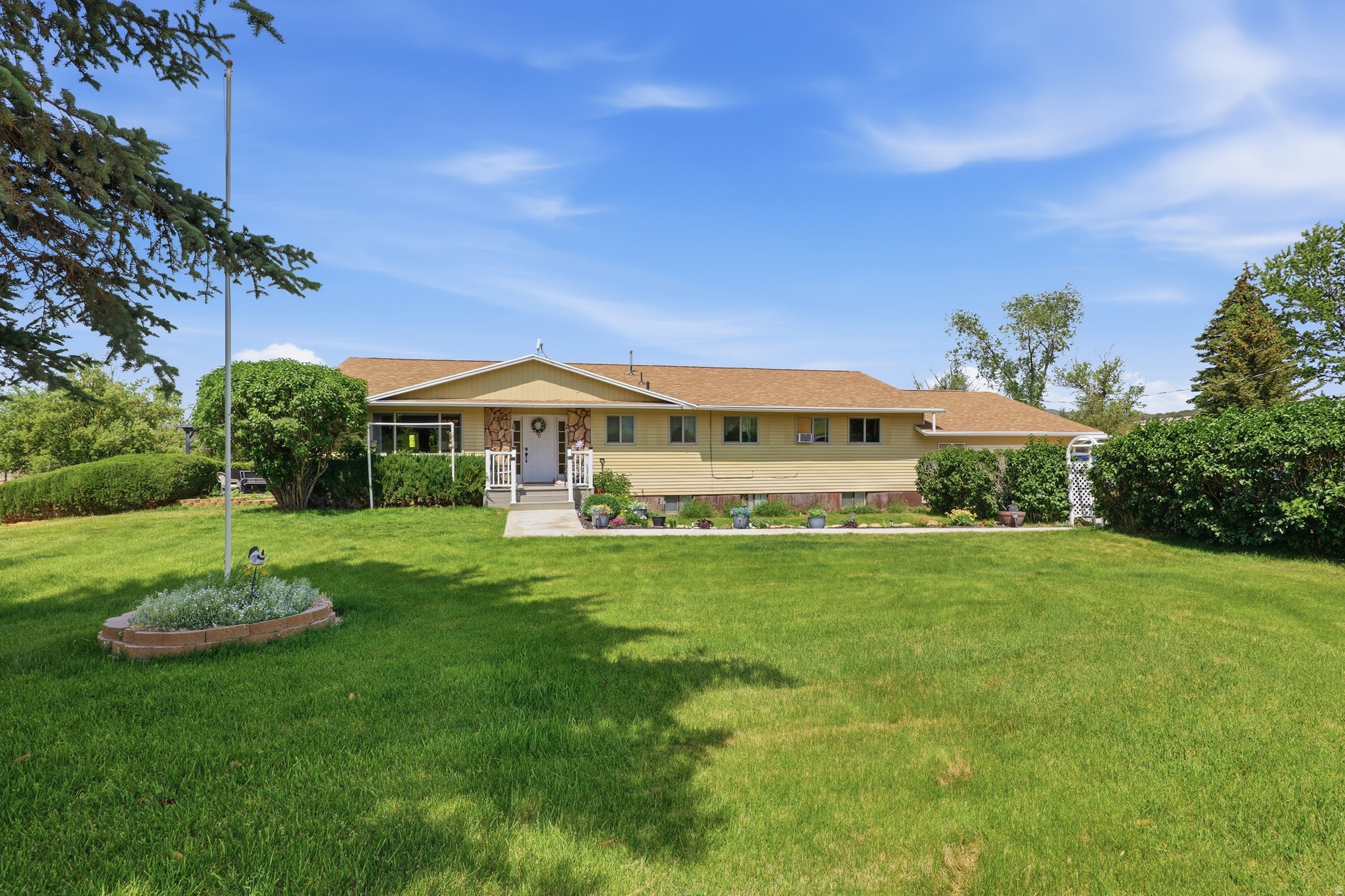 Don't miss your chance at this beautiful 4.85 acre gem! Offering slow and quiet country living with easy access to all of your outdoor adventure dreams. Walk through the front door to a bright, open family room leading into a fantastic kitchen complemented by beautiful new appliances. Enjoy large bedrooms, a finished basement, and a place for everythingyou won't believe the storage options of this home! This spacious rambler has a new roof, updated windows and is ready for friends, family, and entertaining. Spend your summer evenings in any area of the established yard complete with sprinkler system, large side patio, deck off the kitchen, and variety of fruit trees. Included are 10 shares of Cottonwood Gooseberry Irrigation and water-right for the established well. You are invited to come and see for yourself the endless possibilities waiting for you in this home.  The attached garage was enclosed/finished by the previous owner and may not reflect into the square footage as the square footage figures have been provided as a courtesy estimate only and were obtained from Sanpete County. Buyer is advised to obtain an independent measurement. Buyer's Agent to accompany all showings.