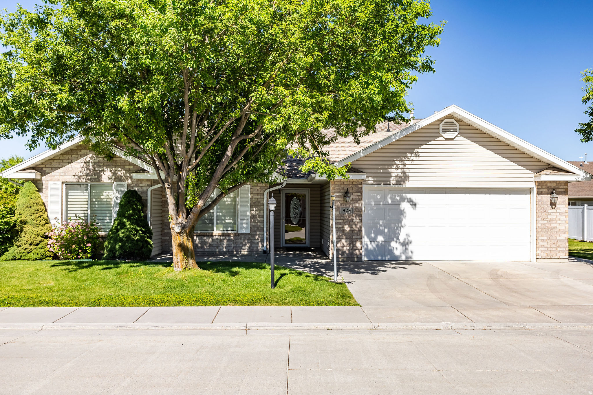 Beautiful single level home in a desirable Logan 55 plus community.   Situated on a spacious corner lot with a wonderful backyard to enjoy, this 3 bedroom, 2 bathroom rambler is in excellent condition and features brand new carpet throughout. Fully landscaped with flat terrain, stunning mountain views, a 2 car garage, and low maintenance fees.