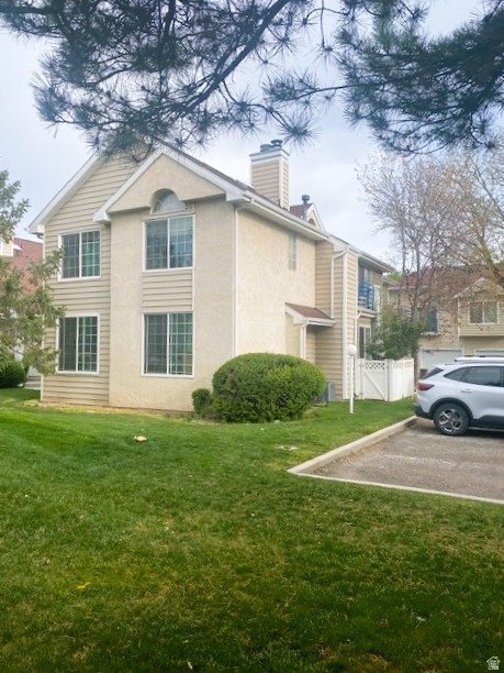 Welcome home to this rarely available main-level condo in the desirable Crosspointe community! This inviting 2-bedroom, 2-bath residence offers comfortable, low-maintenance living. Enjoy a bright kitchen and dining area, a cozy family room with a warm fireplace, and the convenience of an included washer and dryer. Step outside to your own private fenced patio - the perfect spot for morning coffee or winding down in the evening. The attached one-car garage adds everyday convenience. Additional uncovered parking is available throughout the community. Crosspointe residents enjoy an active lifestyle with access to two pools, a relaxing spa, tennis & pickleball courts, a clubhouse, and a fitness center.  Perfectly located near I-215 and I-15, with quick access to shopping, dining, and entertainment - this home blends lifestyle, comfort, and location beautifully. Don't miss this rare main-level opportunity!