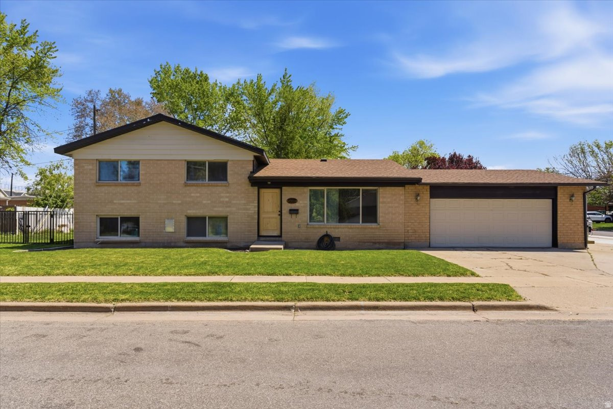 This charming split-level home is located close to schools, shopping, and restaurants! Easy freeway access and close proximity to Hill Air Force Base. This home was recently updated with a fresh coat of paint, newly poured RV pad, and brand new carpet. This home features; 4 bedrooms, 1 full bathroom and 3/4 bathroom, eat-in kitchen with quick access to a fully fenced back yard, and Owner's Suite on lower level. Featuring a large walk-in closet and area for future ensuite. This property has ample parking with a large attached 2 car garage with attached shop/storage room and an oversized RV parking area. Don't miss out on this opportunity to make this home yours! Definitely a must see!