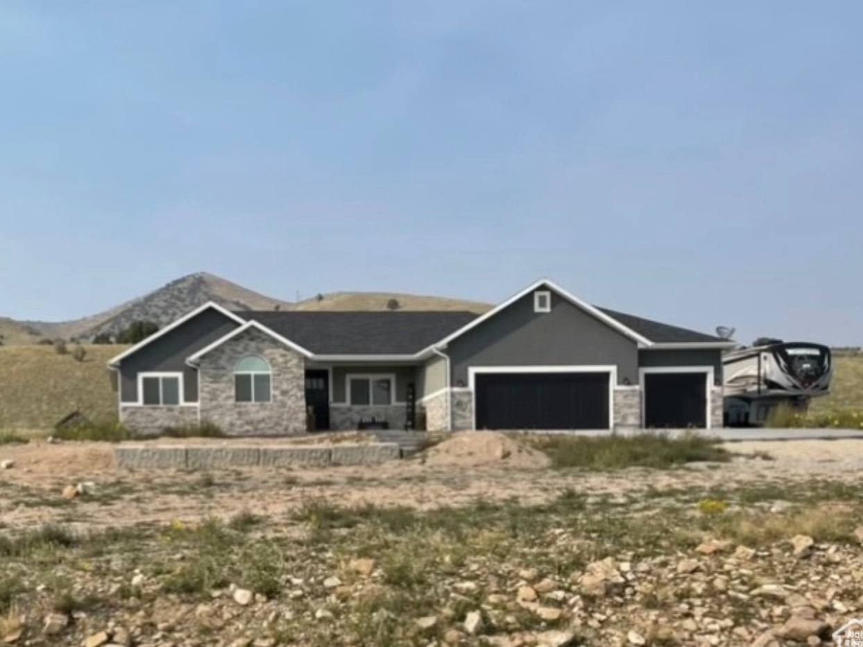Beautiful 5 bed, 3 bath rambler on 3 acres in South Rim with incredible views! Open floor plan with abundant natural light, spacious kitchen with large island, and functional layout. Fully finished basement includes kitchenette and walk-out access, ideal for multi-generational living or potential rental income. Large 3-car garage plus ample space for RV parking, trailers, and recreational toys. Horse property with room for a hobby farm. Enjoy peaceful country living with space, flexibility, and endless possibilities!