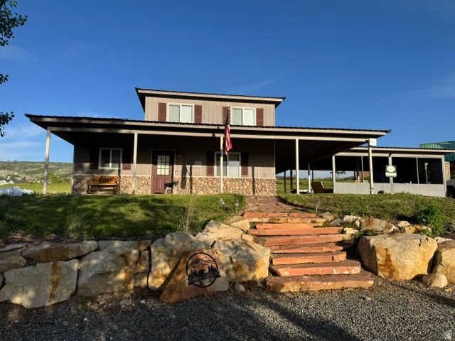 This is the perfect Bear Lake Retreat and right on the 3rd hole of the Bear Lake Golf Course!  So bring the family with 4 bedrooms & 2 full bathrooms just enjoy the peaceful days & nights relaxing and enjoying the views on your breezy covered patio or covered outdoor mancave fun for entertaining after soaking up the sun on the beach or a round of golf!  Recently updated thru-out & has new dishwasher & new AC mini-split.  Fully landscaped with rocks, shrubs, trees and plenty of parking for any guests!  Optional amenities for a fee and just a block away are available at Ideal Beach Resort and include two in-ground pools/hot tubs, mini golf, tennis/basketball courts, playground and sandy beach with boat rentals.  Short term rentals are allowed!  Buyer & Buyer's Agent to verify all.