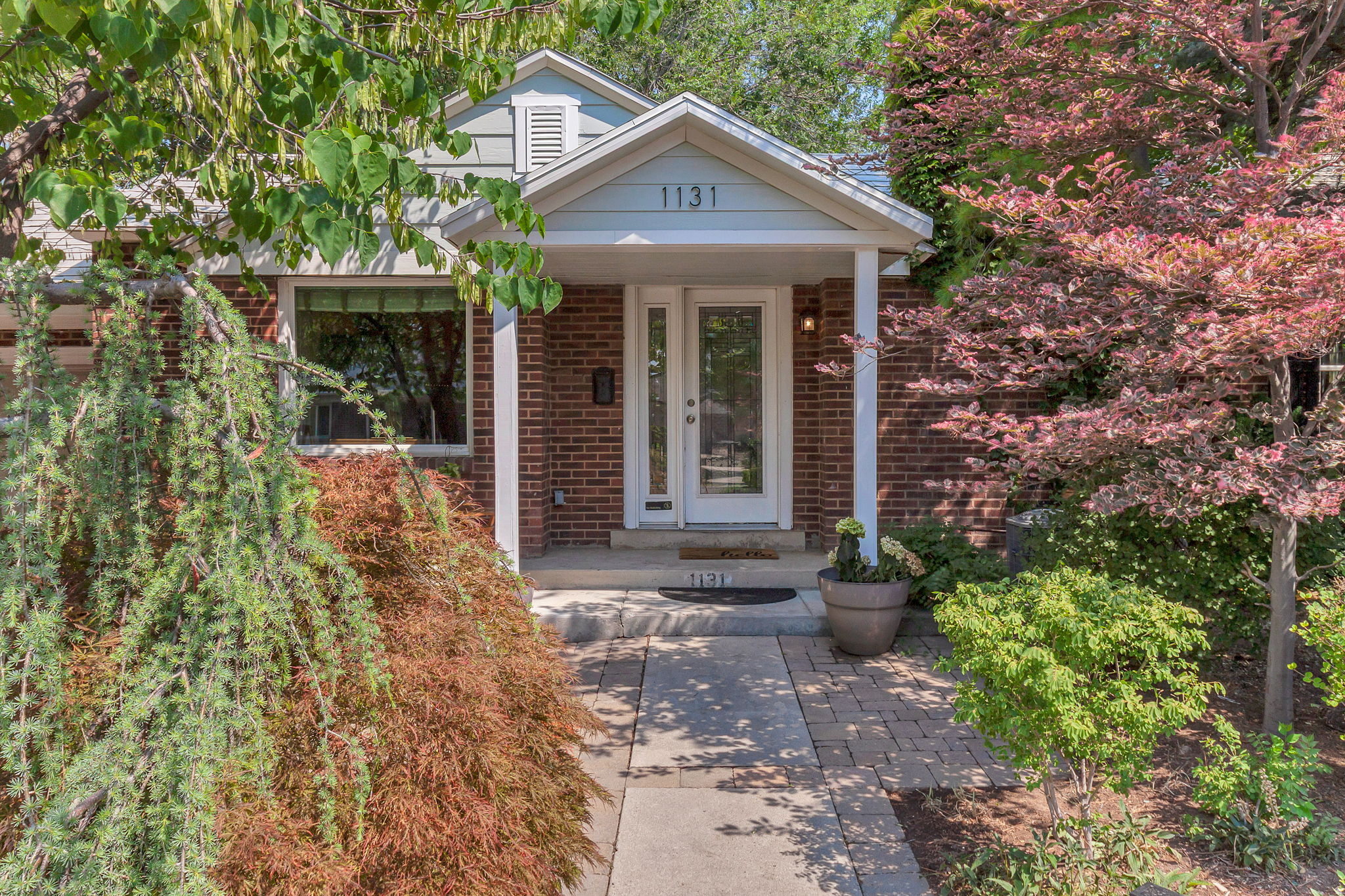 No showings until Friday 6/26 at 10am   **Open House Friday 6/26 from 4-7pm and Saturday 6/27 from 11am-2pm  Welcome to this charming Millcreek home offering 3 bedrooms and 2 bathrooms on the main level, INCLUDING A PRIVATE PRIMARY SUITE! A 4th bedroom and 3rd bathroom will be found in the basement.  The updated kitchen, newer windows, and newer A/C provide comfort and peace of mind, while the functional floor plan makes everyday living easy. The original hardwood floors offer timeless character and present an opportunity to refinish, enhance with new flooring, or simply enjoy as-is.  The stairs & basement have brand new carpet.  Step outside through the charming French doors to a spacious backyard patio designed for entertaining, complete with a built-in gas fire pit and striking fire columns.  The fully fenced yard backs to a gated church park, providing privacy and the rare benefit of no direct backyard neighbors.  A large storage shed offers plenty of room for tools, outdoor gear and seasonal storage.  Ideally located within walking distance of grocery stores, shopping, restaurants and Millcreek Commons, this home combines convenience with a wonderful neighborhood setting.  With some major updates already completed and an unbeatable location, this is a home you'll want to see in person!  Square footage figures are provided as a courtesy estimate only and were obtained from county records.  Buyer is advised to obtain an independent measurement.
