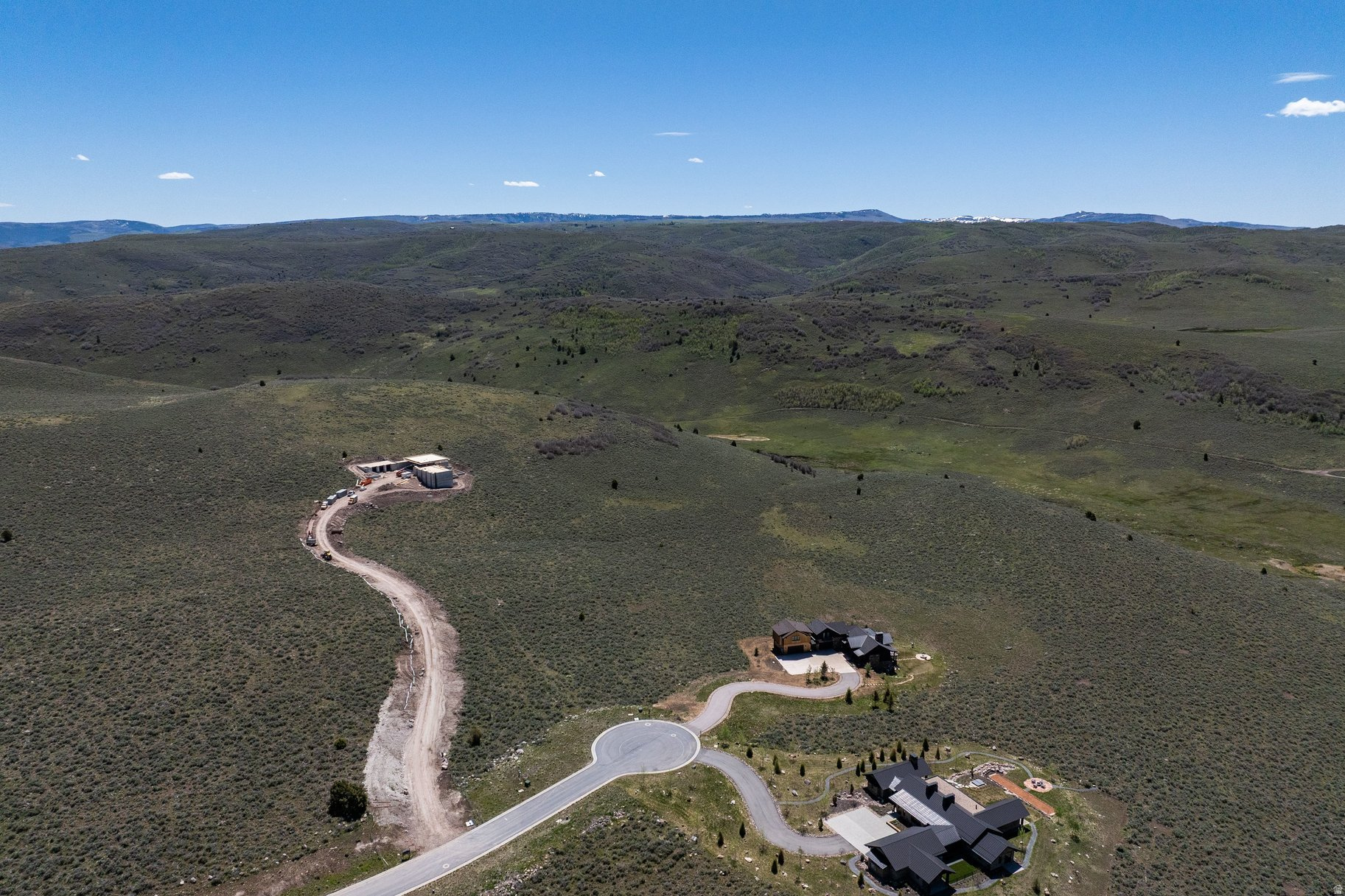 Rare opportunity to own 7.36 acres within the exclusive gates of Victory Ranch. This premier homesite offers a large, easy-to-build pad with the ability to construct up to a 9,000 sq ft residence with a generous 35-foot height allowance. Capture sweeping views overlooking 3,500 acres of pristine backcountry, creating unmatched privacy, serenity, and endless recreation right outside your door. A truly exceptional setting to build a legacy mountain retreat for you and your loved ones.  Victory Ranch is a private, four-season community amidst 6,250 pristine acres along four miles of the Upper Provo River. Amenities include an 18-hole Rees Jones golf course, world-class fly-fishing, miles of mountain biking and hiking trails, 5-stand shooting facility, 4x4 adventures, snowmobiles, ice skating rink, backcountry yurts, fishing ponds, multiple restaurants, a ski-in/ski-out lodge in Park City and more than 3,500 acres of untouched backcountry. The Post Clubhouse includes our concierge, heated pool, hot tubs, fire pit and Outfitters Store. Our Barn amenity features a Pizza and Ice Cream Parlor, Art Studio, Game Room and Indoor Basketball and Sport Court as well as a Fitness Center, Spa and Juice Bar. The swimming pool, waterslide, tranquil stream and pond, tennis, pickle and paddle courts, and event lawn will be sure to provide hours of family fun. Victory Ranch is approximately 15-minutes from Deer Valley and 25 minutes to Park City.