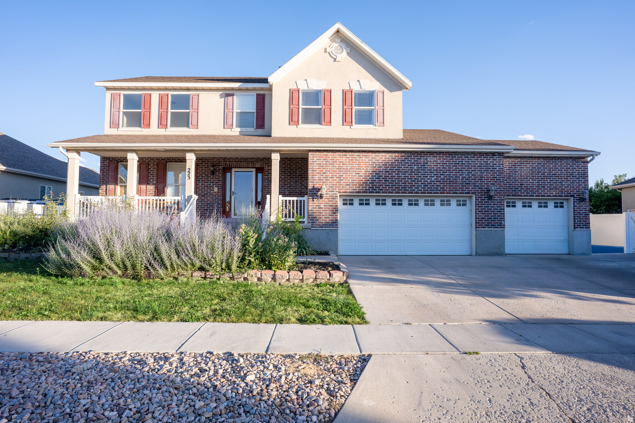 Welcome to this updated Stansbury Park home, located in a great neighborhood with an amazing community feel. Built in 2006 and remodeled in 2024, the interior has fresh paint, brand-new cabinets,  countertops in the kitchen and bathrooms. The main living space offers over 2,300 finished sq. ft. with 4 bedrooms and 2.5 bathrooms, including a master bath with a jetted tub. Amazing backyard includes a deck and patio area, a beautiful garden, a chicken coop, and a 3-car garage. This move-in ready home also features an additional 1,100+ sq. ft. unfinished basement with the ability to add two more bedrooms and another full bathroom.  ***All measurements and community info to be verified by the Buyer and is not guaranteed by the Seller***