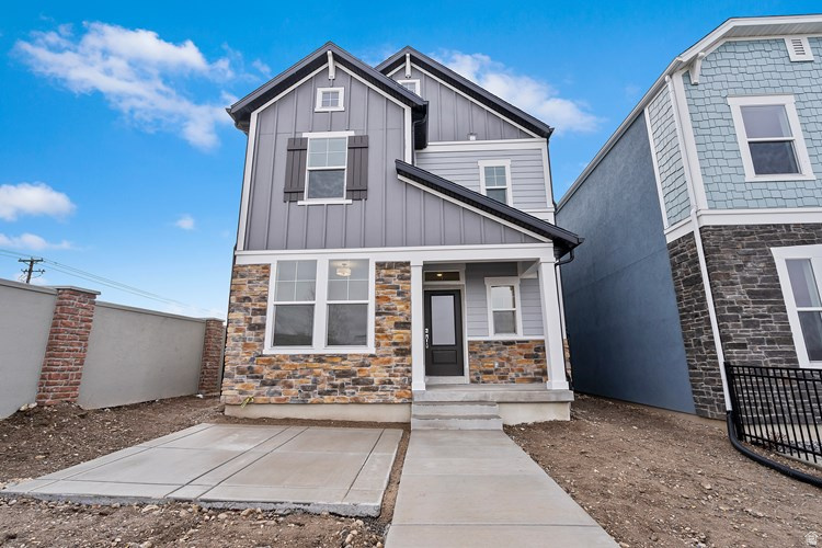 Beautiful David Weekley home featuring the popular "Grindstone" floor plan in the sought-after Ridgeview Carriages community in Highland. This fully finished home offers 4 bedrooms, 3.5 bathrooms, and a bright home office filled with natural light. Framed by the home's many windows, the mountain views feel like living artwork throughout the house-like paintings visible from the office and many of the main living spaces. All this in an unbeatable location within walking distance to Lone Peak High School, Walmart, and the scenic Murdock Canal Trail. Thoughtful upgrades include crown molding and wainscoting in the office and main floor, plus a finished garage with freshly painted white walls and coated floors for a clean, polished look. Enjoy a bright, open layout designed for comfortable everyday living and entertaining. Convenient access to Silicon Slopes, shopping, trails, and top-rated Alpine School District schools makes this an exceptional place to call home. Updated photos coming soon. Owner is a licensed real estate agent.