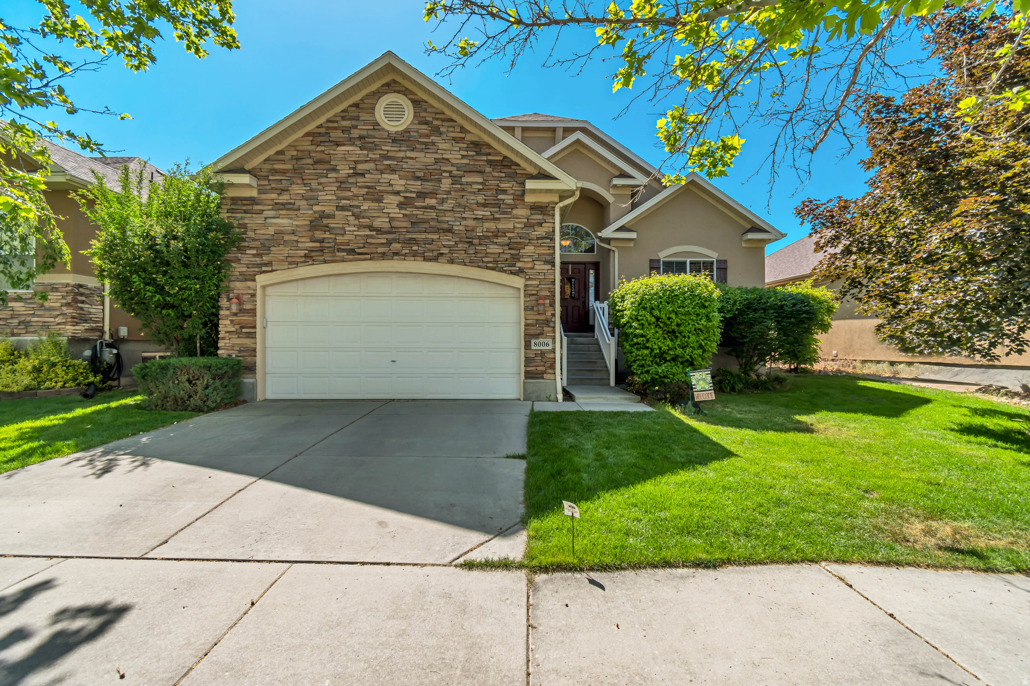 Tucked into one of West Jordan's most established neighborhoods, this home offers the kind of setting that's hard to find-mature trees, a private backyard, and quiet streets lined with pride of ownership.  Hardwood floors, generous living areas, a bright kitchen, and a secluded backyard create the perfect balance of comfort and function. Located just minutes from Jordan Landing, parks, trails, and major commuter routes, this is West Jordan living at its best.  Step outside to a fully fenced yard with room to entertain, relax, or simply enjoy the shade of the surrounding trees.