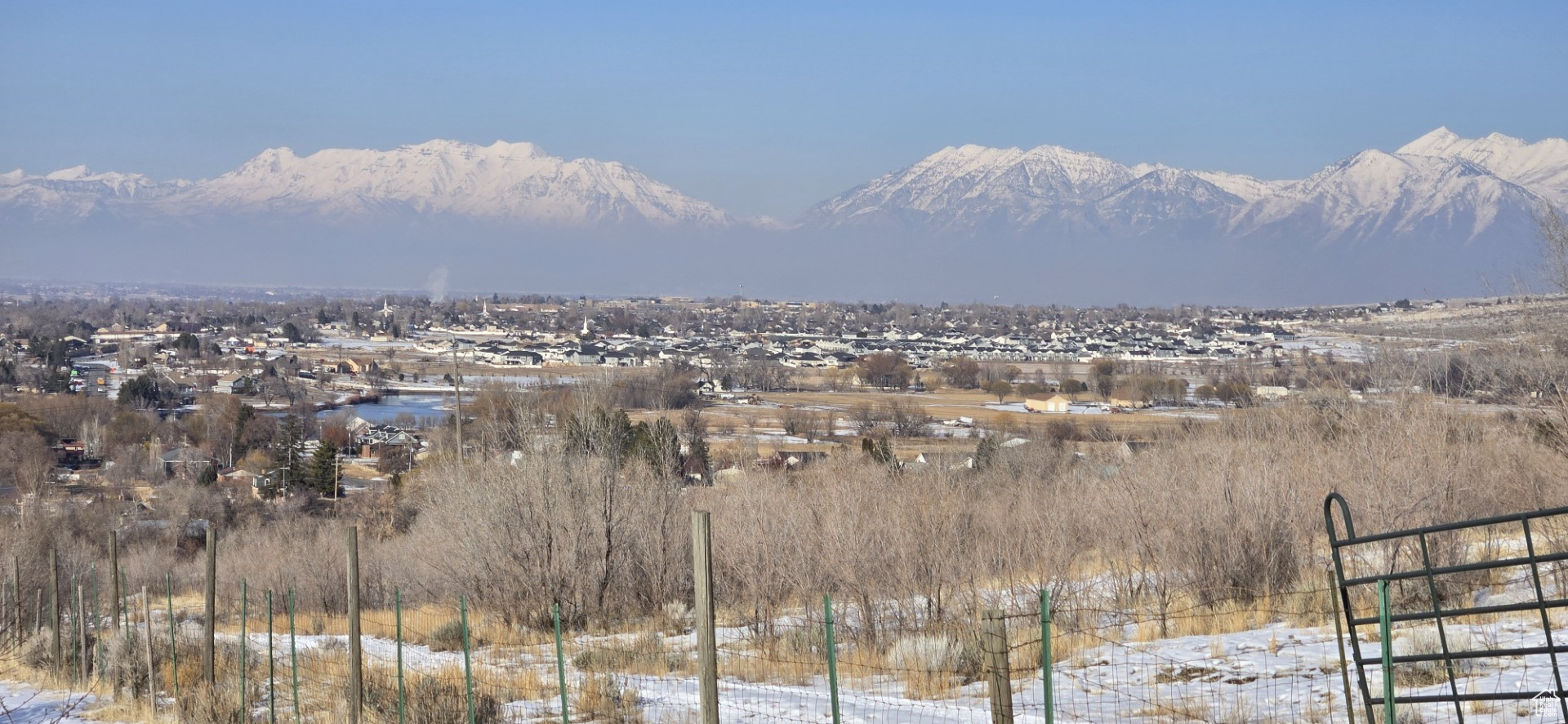 Sale failed and back on market! Beautiful area with spectacular views and a Developers dream! Currently in Residential/ Agricultural (R Ag) zoning and can be subdivided. Home has main floor living and has a walkout basement, laundry and kitchenette. Great possibility of in-law or accessory apartment. Comes with two wells and a spring on the property. Some of the most beautiful views in Utah County! Additional 53.58 acres will be available soon. MAKE SURE YOU CHECK OUT THE DRONE VIDEO OF THIS AWESOME PROPERTY! Click on the TOURS at the top of the page, or copy and paste into your browser.   https://drive.google.com/drive/folders/1QsjkWZ051CmJ-C554J3L1GZsu5fHiA9n?usp=sharing