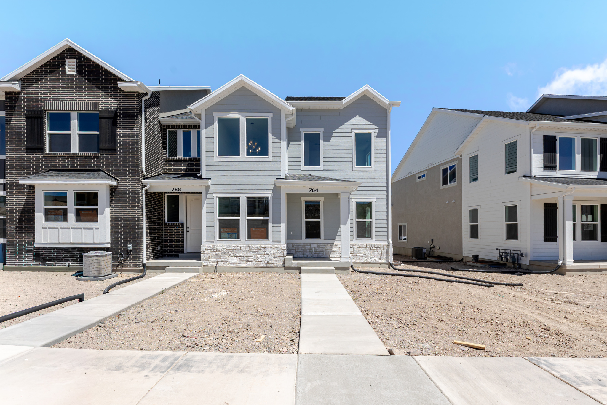 Discover the perfect mix of convenience and comfort with your new townhome at Highridge! Enjoy the benefits of multi-story living and a spacious two-car garage, without the upkeep of a single-family home. Love where you live with community perks like a clubhouse with a gym, a sparkling pool, and pickleball courts. Plus, you'll be part of the growing Mt. Saratoga master-planned community, designed with parks, trails, and open spaces for you to explore. Don't wait! Reach out today to learn more or schedule your visit!