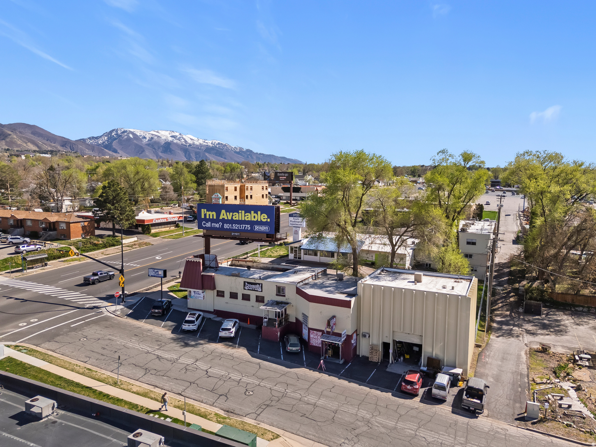 Retail/Flex Investment Opportunity in Prime South Ogden Location! Situated in a highly sought-after area of South Ogden, this retail/flex building represents an outstanding opportunity for investors or owner-users. Currently accommodating four tenants, the property provides immediate income potential alongside flexibility for future occupancy or business growth. Encompassing approximately 10,000 square feet, the building offers retail, office, and warehouse spaces - including a 12' x 11' overhead door for efficient loading and logistics. With prominent visibility and high traffic volumes (34,000 AADT) on Washington Blvd, the site is well-positioned for diverse commercial applications. This asset is ideal for those seeking a strategically located, income-generating property with adaptable functionality. The property is located within a certified Economic Opportunity Zone and holds Commercial zoning as well as South Ogden City HUBZone certification.