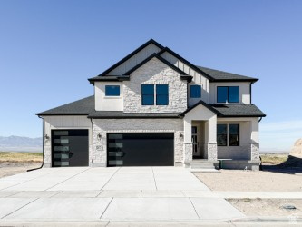 This home is STUNNING! It's everything a dream home should be. Sitting with a view of the Temple to the front and a golf course to the back. This is a unique property in a quiet corner of Tooele County. If you love to cook this kitchen is for you! Featuring a gas cook top, hood vent and double ovens, beyond being functional it is also beautiful! The kitchen and dining room open into the family room with a dramatic vaulted ceiling and a full wall of windows to capture the view. This home has 4 bedrooms and 2 1/2 baths. The primary bedroom features a luxurious bath with a separate large shower and stand alone tub. Every part of this home has been well thought out for both functionality and beauty. Builder will give 5000 sq ft of sod.  Ask about our preferred lender incentive of $21,000.  Square footage figures are provided as a courtesy estimate only and were obtained from builder plan.  Buyer is advised to obtain an independent measurement.