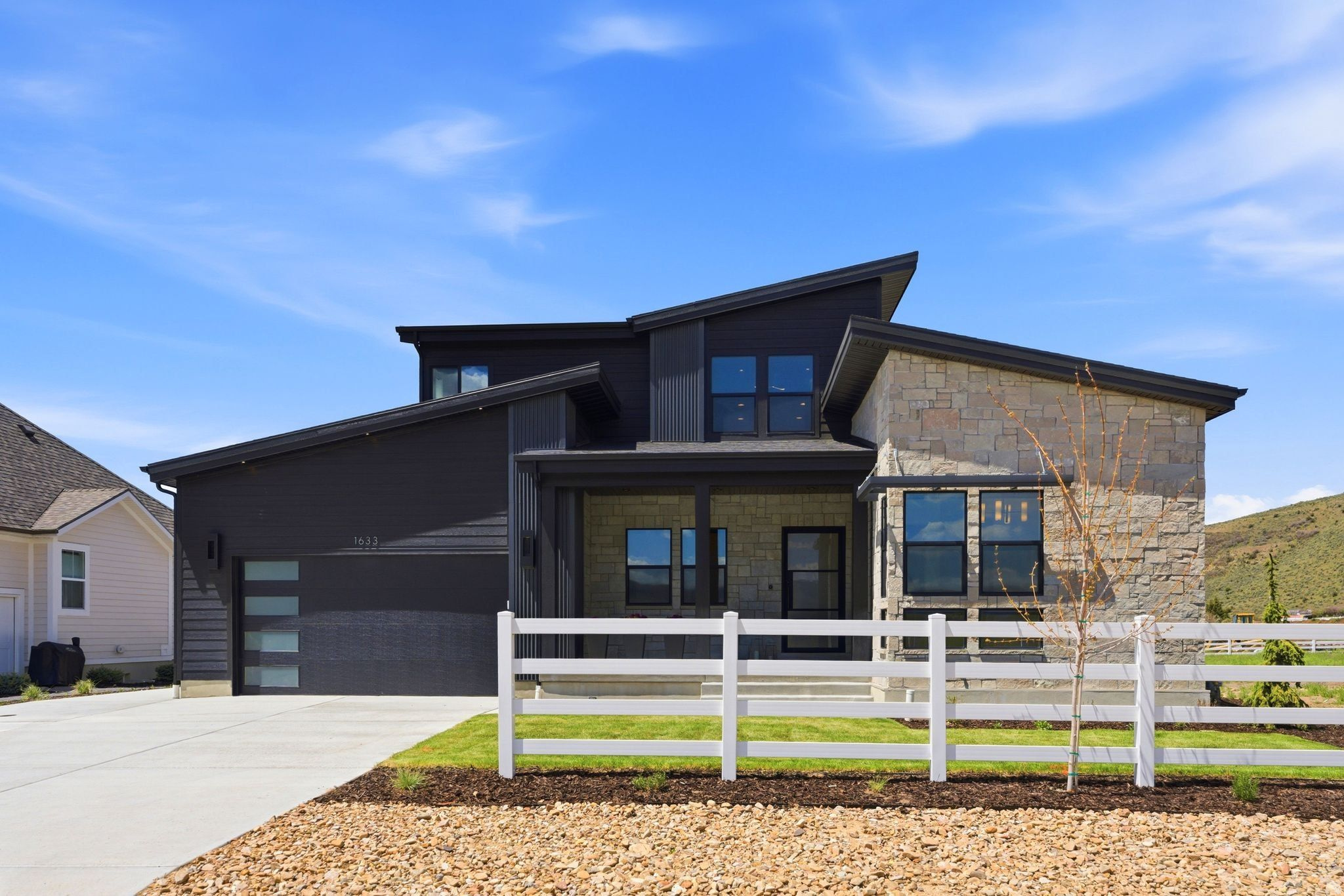 Refined mountain living without the upkeep, and luxury at an incredible price. At 6,326 finished square feet, 1633 Rocky Mountain Way is one of the most thoughtfully designed new construction luxury homes in Stewart Ranches in Francis, Utah. Built in 2025, fully complete, and move-in ready. High-end living begins the moment you arrive. Six en suite bedrooms, each with a private bath and custom walk-in closet. Whether this becomes a multi-generational family home, a luxury retreat near Park City, or simply a residence with room to breathe, the layout delivers privacy and separation that most homes this size cannot. A main-level primary suite anchors the home, with additional bedrooms spread across three levels so everyone has their own space. The Thermador kitchen and generous butler's pantry are designed for the family that cooks, entertains, and fills a table. The open great room frames Wasatch and Uinta mountain views through expansive windows. Two gas fireplaces add warmth to every season. The lower level delivers a full wet bar, dedicated home gym, and expansive entertainment area, plus two additional en-suite bedrooms ideal as a guest wing, teen retreat, or in-law suite.Radiant floor heating, automated blinds, whole-home audio, reverse osmosis water system, hot water recirculation, and a 3-car tandem garage with ski storage and Costco door. Every detail considered, nothing left undone. HOA partially maintains the landscaping grounds and covers snow removal, so your weekends stay yours. Spend them the way Utah was meant to be lived - out there! The Uinta Mountains are your real backyard, Utah's gateway to year-round outdoor recreation. Francis is a small, serene community tucked between the Wasatch and Uinta ranges, defined by quiet roads, open skies, and true mountain character. Just 20 minutes to Deer Valley East Village, 30 min to Park City and 45 minutes to Salt Lake City International Airport- all destinations well within reach.