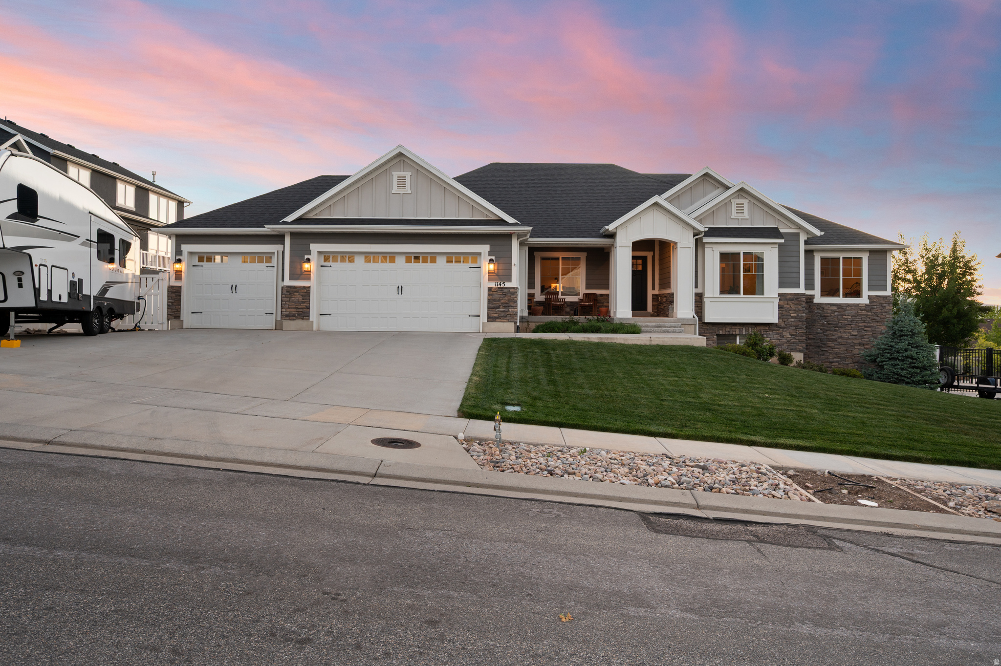 This beautiful rambler offers over 4,200 sq ft with wide-open living spaces, vaulted ceilings, RV parking, solar, and a walkout basement ready for whatever comes next-extra bedrooms, a game room, a home gym, a theater space, or all of the above.  The main living area was designed with connection in mind, featuring an open kitchen and great-room setup that keeps everyone together whether you're hosting friends, helping with homework, or enjoying a quiet night in. Large windows and sliding glass doors bring in natural light and open onto the backyard, with plenty of room to create your ideal outdoor space.  The spacious primary suite includes vaulted ceilings, a walk-in closet, and a private bathroom, while the oversized three-car garage gives you extra storage for bikes, gear, tools, and all the things that come with a busy household.