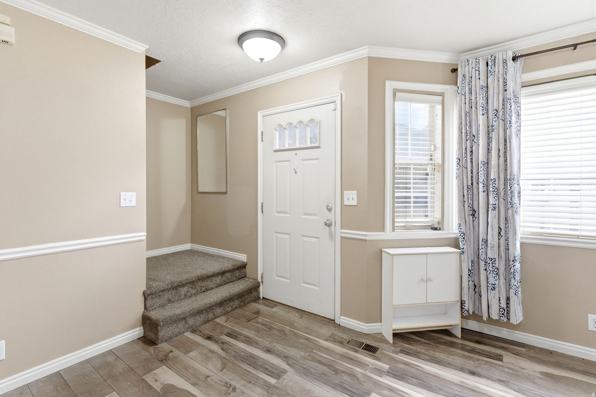 **New carpet throughout home** Beautifully located home within a short distance to a large public park, minutes from the freeway and local university, with stunning mountain views.