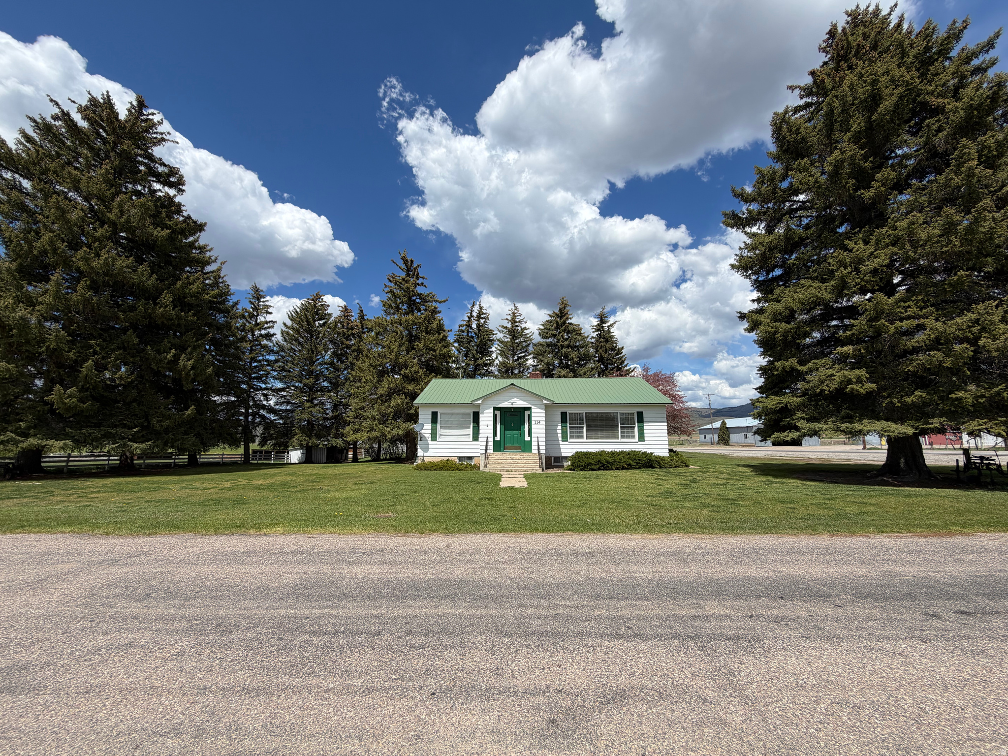 Wonderfully maintained farmhouse in Georgetown on 1.65 acres with many different kinds of outbuildings! Great pasture space to the west of the home, all fenced in, ready for your animals. The home itself has been updated in many areas, with a large living room/dining space, a second dinette room (or could be used as 5th bedroom), very bright and cheery kitchen with antique stove and other appliances included! Beautiful original hardwood finished nicely and exposed in many rooms, and other rooms with updated LVP or tile. 3 beds and 2 baths upstairs, with laundry and en suite bed/bath downstairs. Big family room downstairs as well, with wood burning fireplace to complement the gas forced air heat throughout the home! Seriously unique property you don't want to miss out on. Check it out today!