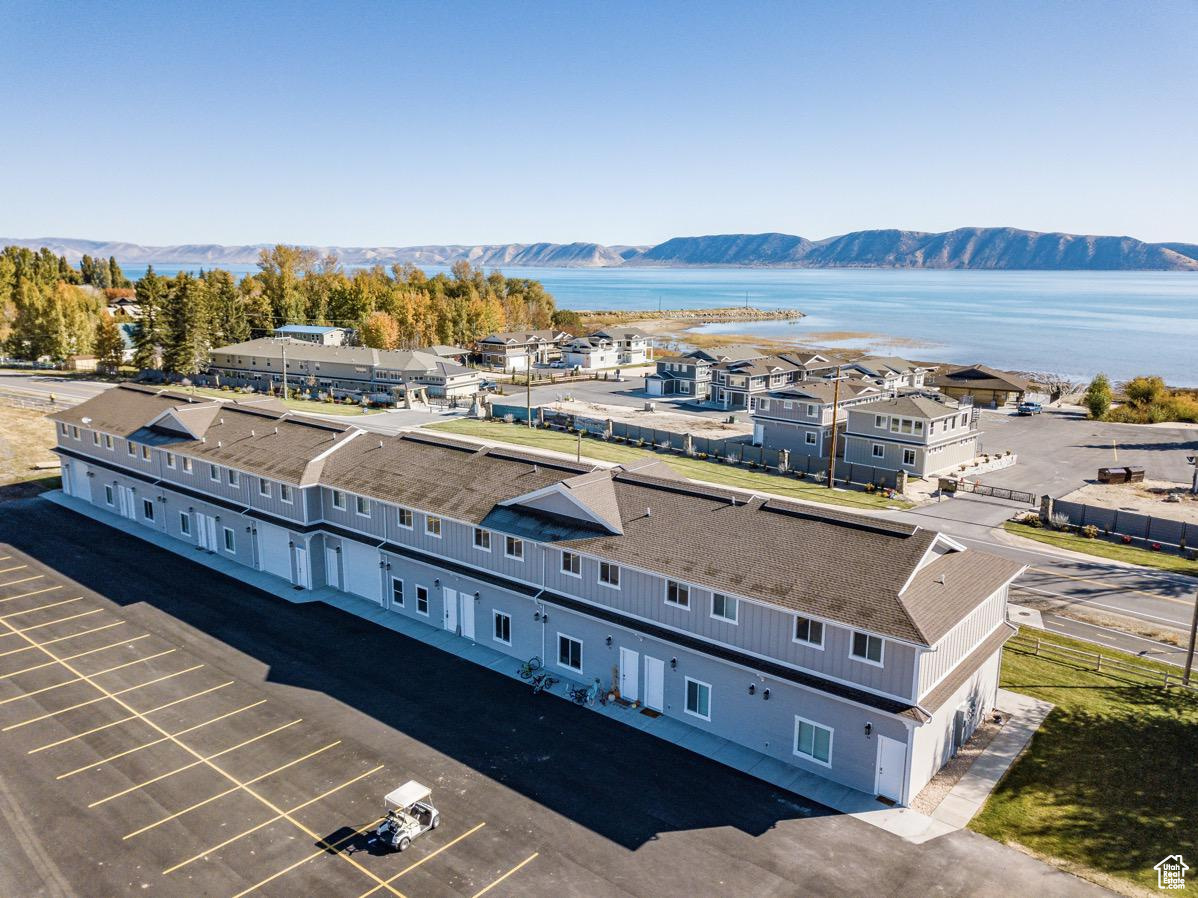 This high end Legacy Condo is right in the heart of Garden City. This condo is ready for you to enjoy and/or nightly rent out! With 4 bedrooms, 2 bath this stunning unit sleeps 12 people and is fully furnished with everything you need to enjoy your stay at Bear Lake. You are just a few steps away from enjoying their private sandy beach, swimming pool, hot tub, pickleball court and clubhouse. The bike path is right out your front door for a nice summer walk, or ride. Located close to the city park, restaurants, shops and so much more. Don't forget the large covered deck to watch the amazing sunrises over Bear Lake. This place has it all!