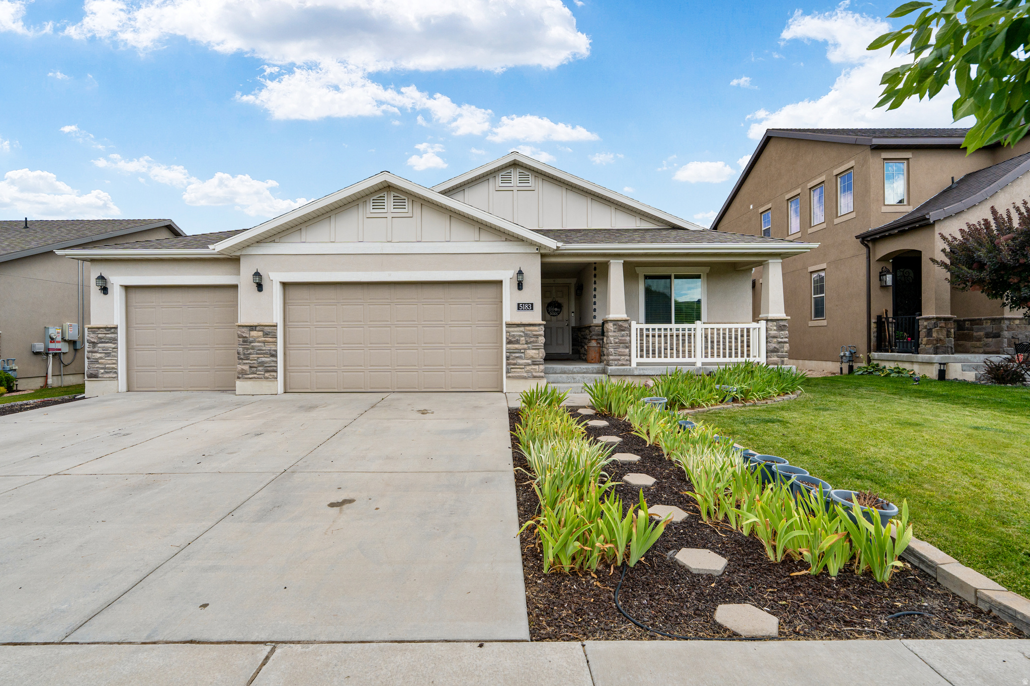 Welcome to this stunning 5 bedroom, 3 bath rambler, built in 2014, offering modern comfort and timeless charm.  Inside, you'll see an open layout with neutral colors, a cozy fireplace, and a beautifully finished basement - perfect for entertaining or extra space.  Step outside to a wonderful covered patio with a ceiling fan, ideal for dining al fresco.  Enjoy the expansive, well-maintained yard with lush green grass - ideal for outdoor fun and relaxation.  Don't miss this move-in ready home in a fantastic neighborhood!