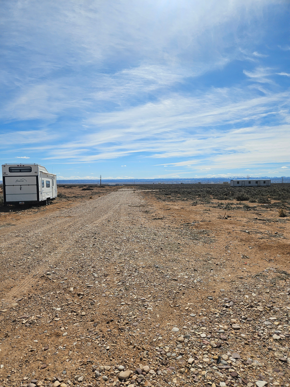 5 acres. Good road access. Flat usable land. Surveyed. Site assessment test passed. Owner financing available. Directions. Go East on 6000 S for 4.5 miles.