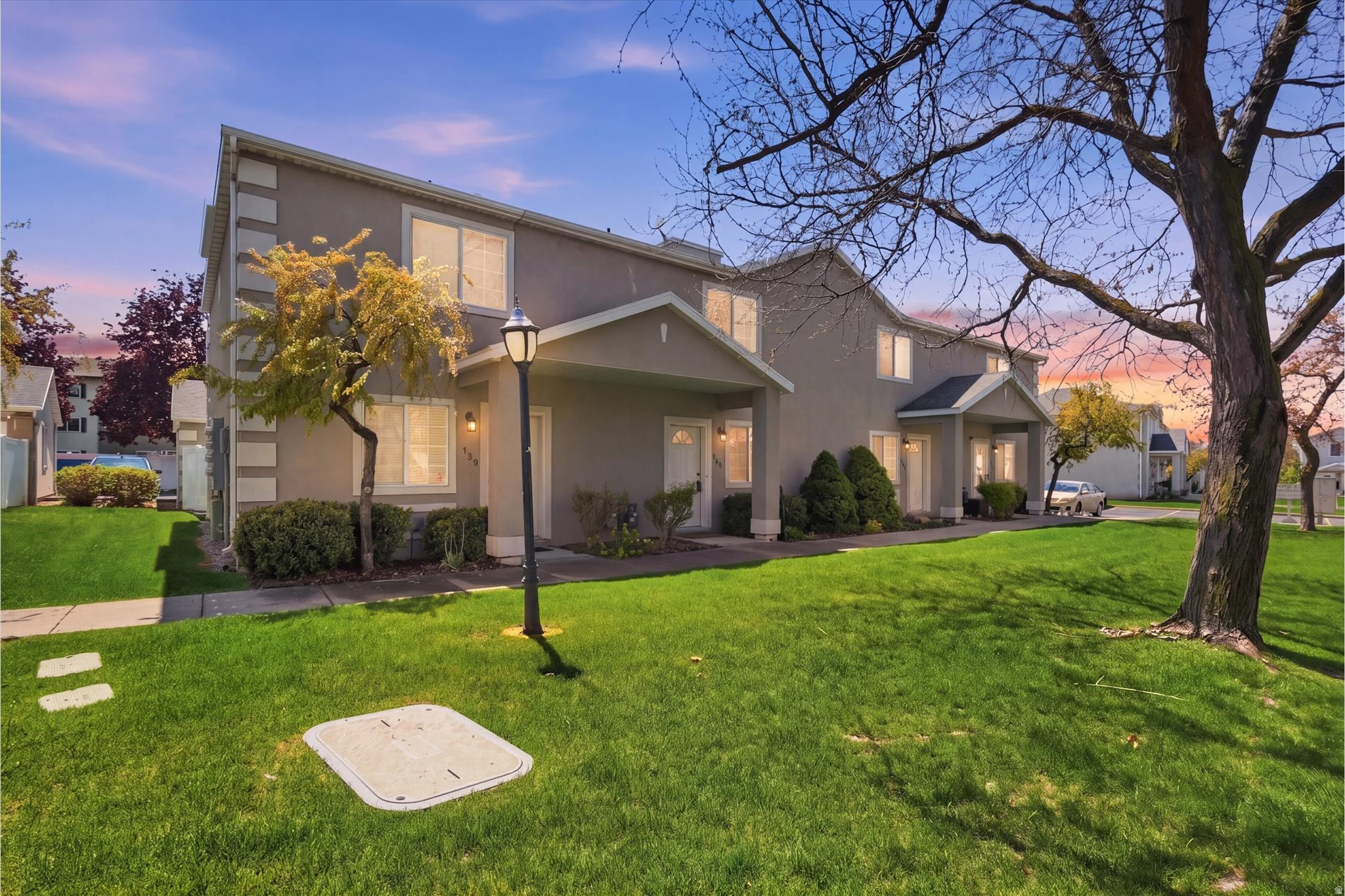 This beautifully updated unit is truly *like new*! Recent upgrades include brand-new carpet, fresh paint throughout, and a sliding glass door that brings in plenty of natural light. The home comes equipped with a washer and dryer, along with a stove and microwave for added convenience. You'll also find thoughtful updates such as a new kitchen faucet, two new toilets, updated light fixtures, and modern faucets throughout. Major systems have been taken care of as well, with a new furnace and central A/C providing comfort and efficiency year-round. With so many upgrades already completed, this move-in-ready property offers both comfort and peace of mind-making it an excellent investment in your future.
