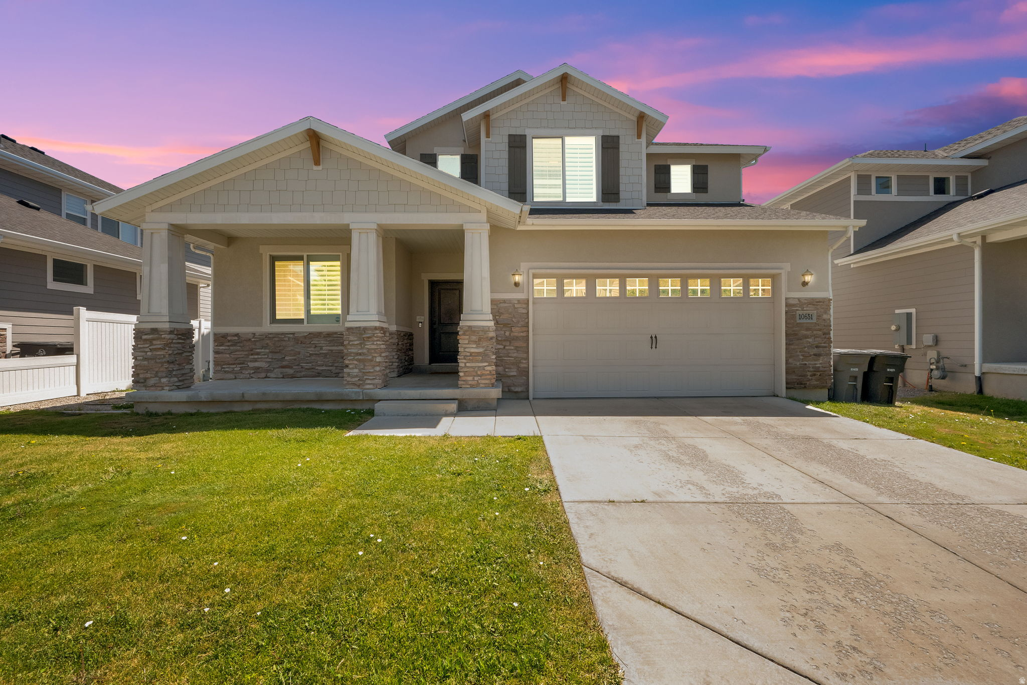 Discover the perfect blend of timeless Craftsman architecture, generous living space, and an unbeatable South Jordan location in the highly desirable Rushton Meadows community. Ideally situated on the edge of Daybreak, this exceptional home offers all the convenience, parks, shopping, restaurants, and recreation that make the area so sought after-without the additional expense of Daybreak HOA fees. Designed with both everyday living and entertaining in mind, this spacious two-story home features 5 oversized bedrooms and 3.5 bathrooms with a floor plan that offers room for everyone. Rich Craftsman styling, inviting curb appeal, and beautifully proportioned living spaces create a warm and welcoming atmosphere from the moment you arrive. The true centerpiece of the home is the extraordinary primary suite, thoughtfully designed as a private owner's retreat. Occupying nearly half of the upper level, this luxurious space feels more like its own private wing than a traditional bedroom. Enjoy an expansive bedroom, dual walk-in closets, double vanities, and a spacious ensuite bath designed to provide comfort, privacy, and everyday luxury. The open-concept main level offers seamless flow between the kitchen, dining, and living areas, making it ideal for family gatherings, holidays, and entertaining guests. Large bedrooms, abundant storage, and a highly functional layout provide flexibility for growing families, remote work, or multigenerational living. Located in one of South Jordan's most desirable neighborhoods, Rushton Meadows places you just minutes from Daybreak, Mountain View Corridor, Bangerter Highway, shopping, dining, schools, parks, walking trails, and numerous outdoor recreation opportunities. This rare combination of location, space, architectural charm, and value makes this home an exceptional opportunity in today's market. Square footage figures are provided as a courtesy estimate only. Buyer is advised to obtain an independent measurement.