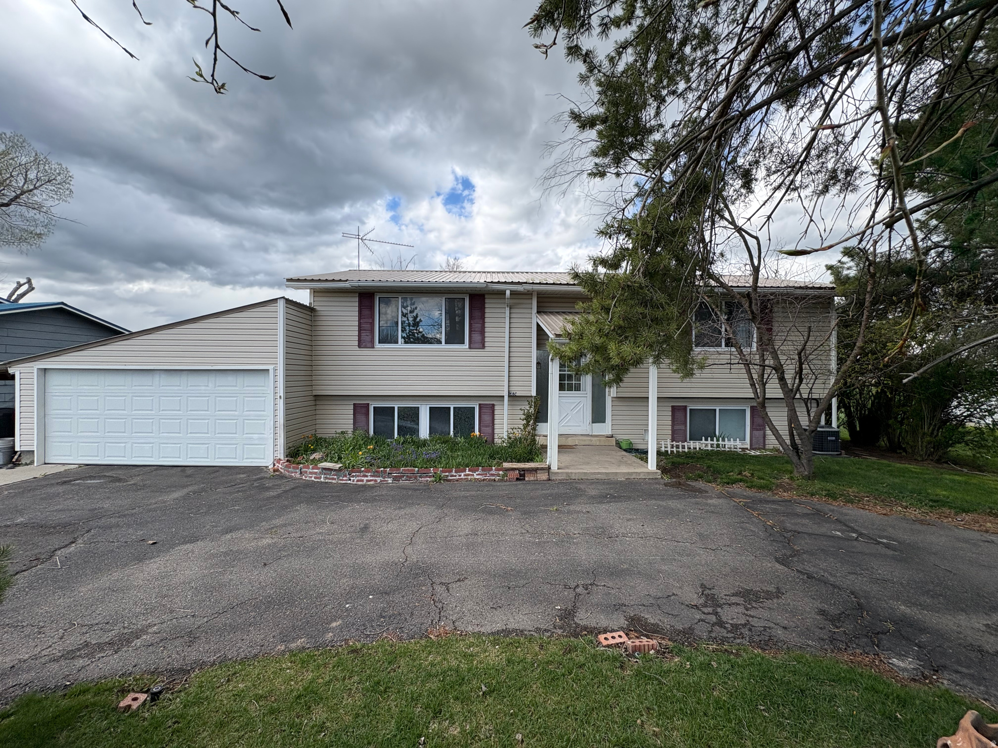 This home is situated in the charming town of Lewiston with easy access to the highway. The home has been updated with brand new carpet throughout the living areas and fresh vinyl floors in the high traffic areas. The yard features mature trees and a spacious backyard that overlooks open fields to the north. The home is situated minutes away from Lee's grocery and the Lewiston elementary school.   Square footage figures are provided as a courtesy estimate only and were obtained from county records .  Buyer is advised to obtain an independent measurement.