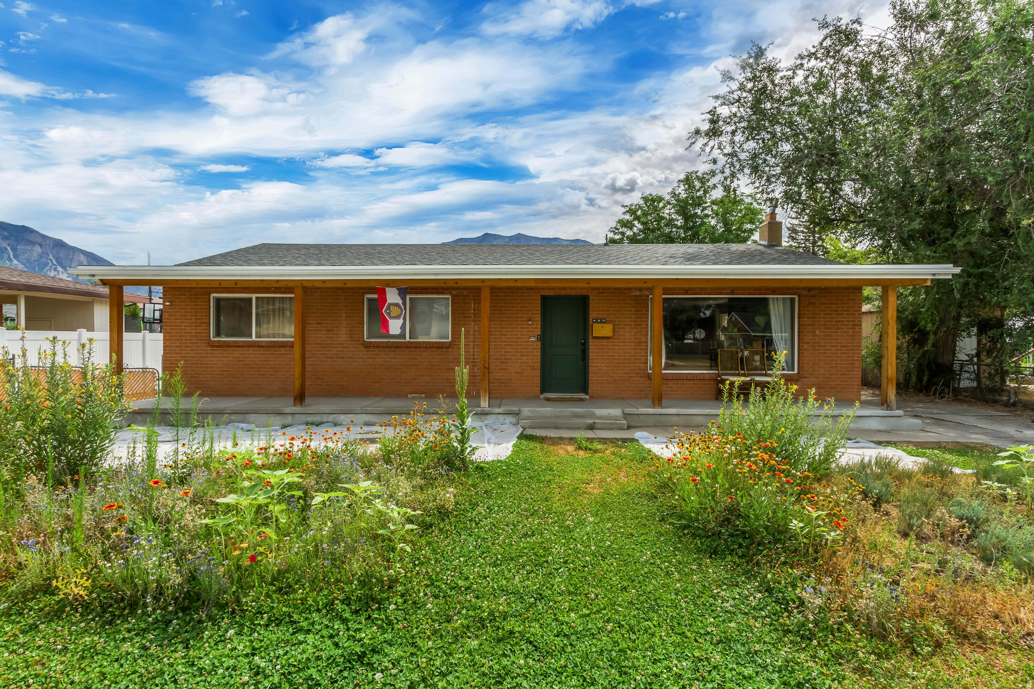 Welcome home to this charming property in the heart of Orem! Situated on nearly a quarter-acre lot, this home offers a spacious, fully fenced backyard with plenty of room to relax, entertain, garden, or play. Enjoy the convenience of a detached garage plus an additional side parking pad, providing ample space for vehicles, trailers, or recreational toys.  Inside, you'll find a warm and inviting living area centered around a beautiful fireplace with an eye-catching hearth-perfect for cozy evenings at home. The kitchen features stainless steel appliances, making meal preparation both stylish and functional.  One of the standout features is the fully paid-off solar panel system-no lease and no contract to assume-offering energy efficiency and long-term savings. Ideally located near shopping, restaurants, hospitals, parks, and schools, with quick access to everything Orem has to offer. This is a wonderful opportunity to own a home that combines comfort, convenience, and value. Schedule your private showing today!
