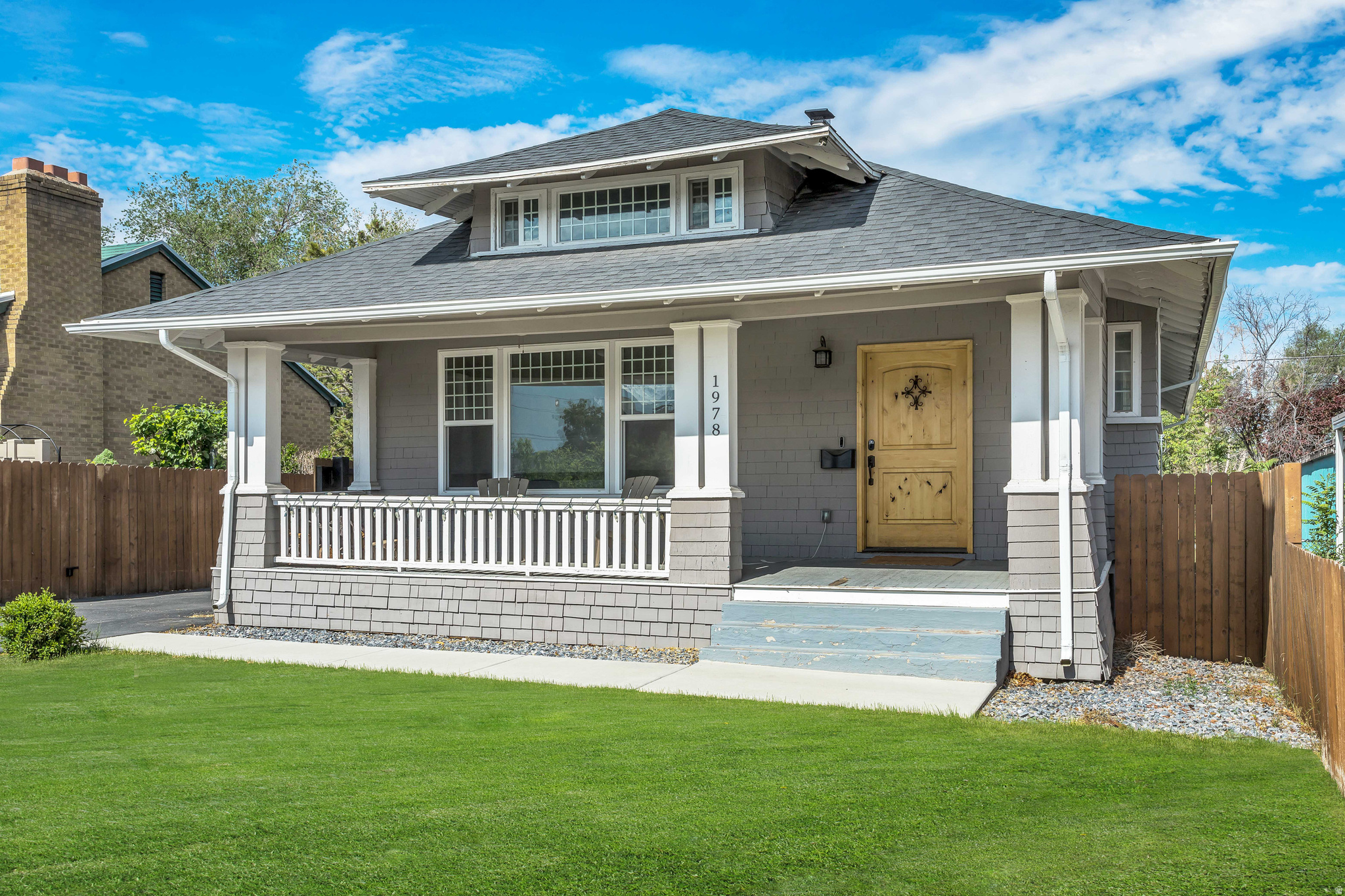 Rare Sugar House opportunity featuring two separate residences: a beautifully remodeled main home and a permitted 2021-built ADU above an oversized 700-square-foot, two-car garage. Live in the heart of Sugar House, where Salt Lake's vibrant 2100 South corridor offers some of the city's best local restaurants, coffee shops, boutique shopping, entertainment, and Sugar House Park, all just moments from your front door. The charming main home has been extensively updated over the past six years while preserving its original character, with improvements including a new sewer connection (formerly septic), updated plumbing and electrical (including meter), HVAC system, roof, windows, lighting, on-demand water heater, driveway, fully fenced yard with locking gate, flooring, custom kitchen with updated appliances, and beautifully renovated bathrooms. Original antique fireplaces and a finished attic add warmth and timeless charm. The newly permitted one-bedroom ADU, built in 2021 above the spacious garage, offers outstanding flexibility for rental income, guests, or multigenerational living. Enjoy beautiful mountain views from the welcoming front porch, enhanced by the open feel created by the parking area across the street. Level 3 of the listing represents the details of the ADU.  The main home has projected long-term rental income of approximately $4,000 per month, while the ADU previously generated short-term rental income under the current owner's operation. Buyers are encouraged to verify rental opportunities. Both units are currently vacant, creating endless possibilities for an owner-occupant, investor, or house-hacker seeking one of Salt Lake City's most desirable neighborhoods.