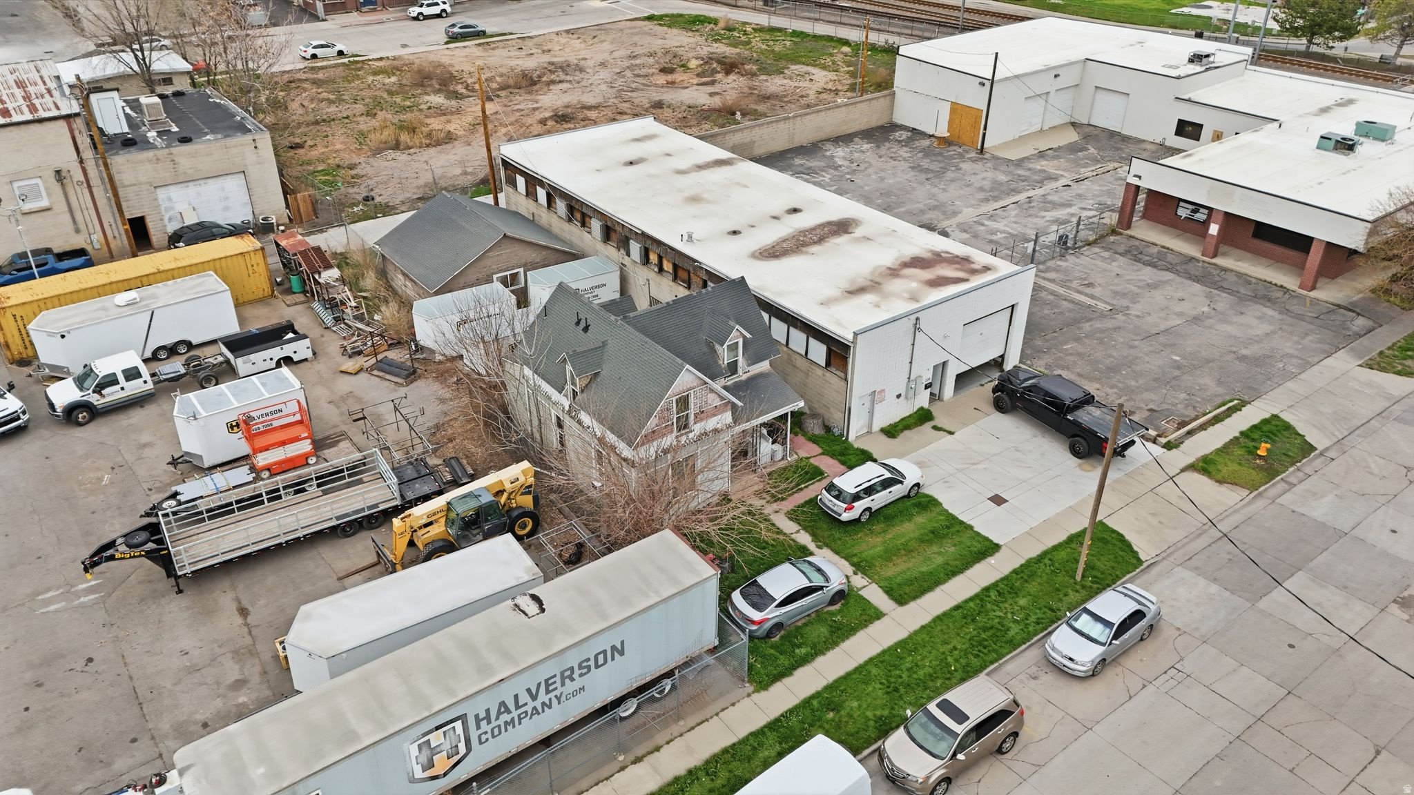 Versatile mixed-use opportunity in the heart of Salt Lake City! Redevelopment opportunity. Zoned MU-11 providing maximum multifamily potential. This unique property includes two parcels being sold together. 220 w Lucy Ave 15-12-457-035-0000 and 222 w Lucy Ave Parcel 15-12-457-033-0000 that offer the perfect blend of residential comfort and commercial potential, ideal for investors, developers, entrepreneurs or buyers with a vision. The home located at 222 w Lucy Ave is a 4 bed, 2 bath, 1,712 sq ft 0.11 Lot. Built in 1887. The shop located at 220 w Lucy Ave built in 1971 with 3,600 sq feet of space on a 0.11 lot offers excellent visibility and flexibility for a variety of business or residential uses. This property is in a prime location with unmatched potential. Close to everything and provides convenient access to the freeway, shopping, stores and downtown. Don't miss this rare opportunity to own a highly adaptable property in a growing area! Buyer and buyers agent to verify all.