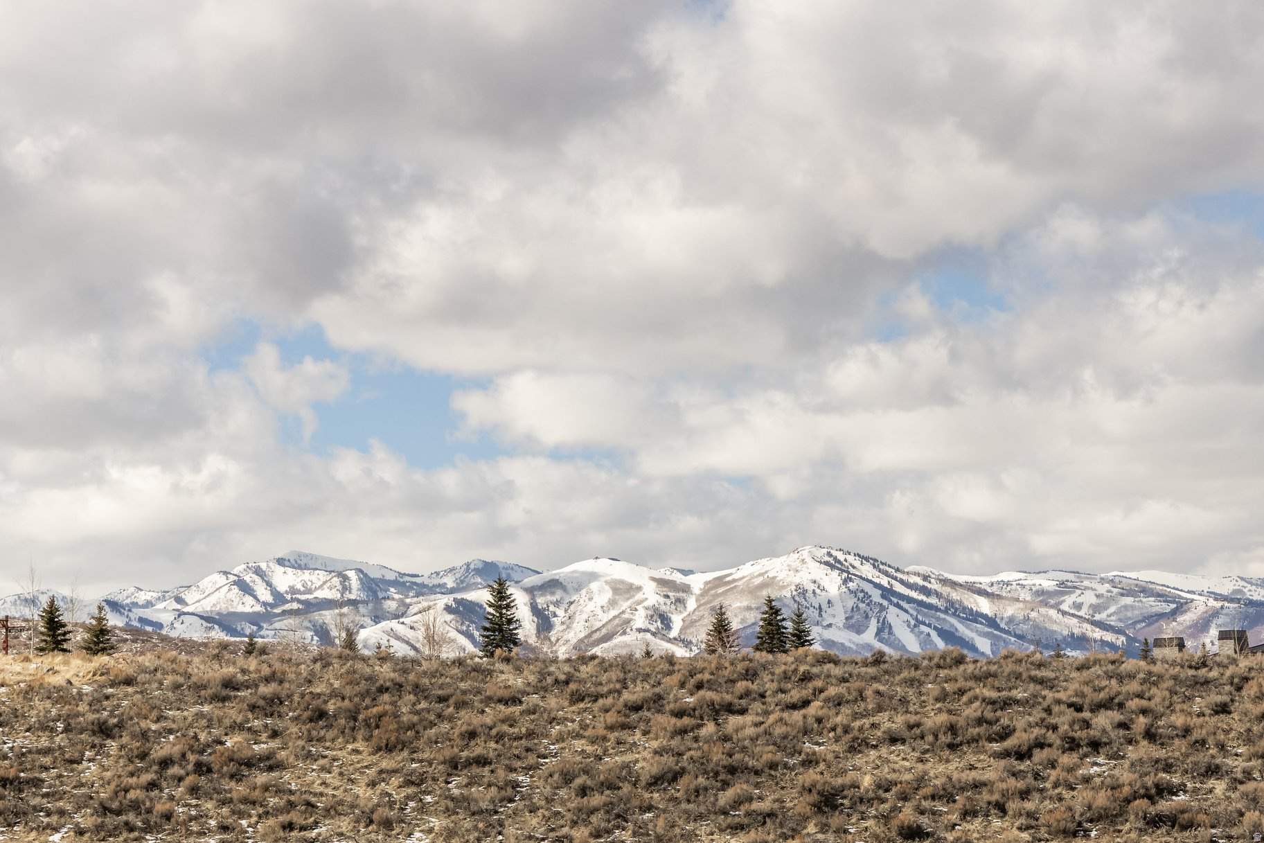 Beautiful 1.43-acre homesite in Victory Ranch featuring stunning views of the signature 17th tee box and surrounding Uinta mountain landscape. Ideal setting for a custom mountain retreat with access to world-class golf, private amenities, and year-round outdoor recreation. Victory Ranch is a private, four-season community amidst 6,250 pristine acres along four miles of the Upper Provo River. Amenities include an 18-hole Rees Jones golf course, world-class fly-fishing, miles of mountain biking and hiking trails, 5-stand shooting facility, 4x4 adventures, snowmobiles, ice skating rink, backcountry yurts, fishing ponds, multiple restaurants, a ski-in/ski-out lodge in Park City and more than 3,500 acres of untouched backcountry.  Our newest amenity, the state-of-the-art Golf Clubhouse features stunning views of the Jordanelle Reservoir and Deer Valley, upscale dining opportunities,  golf simulators,  and a well-appointed pro shop. The Post Clubhouse includes our concierge, heated pool, hot tubs, fire pit and seasonal grill.  The Barn features a Pizza and Ice Cream Parlor, Art Studio, Game Room and Indoor Basketball and Sport Court as well as a Fitness Center, and Spa.  The new swimming pool, waterslide, tranquil stream and pond, tennis, pickle and paddle courts, and event lawn will be sure to provide hours of family fun. Victory Ranch is approximately 15-minutes from Deer Valley and 25 minutes to Park City.