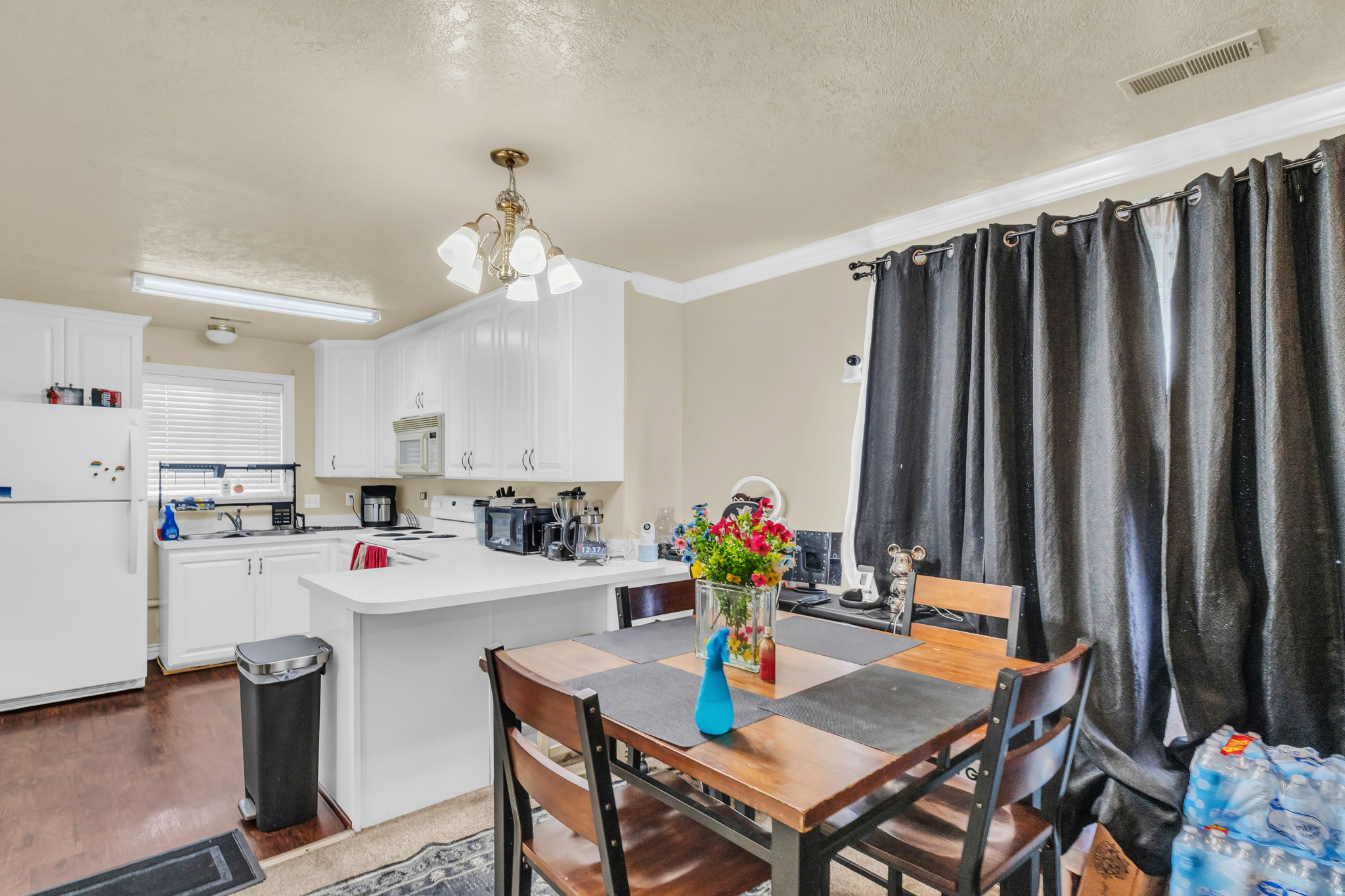 Fantastic top-level, end-unit condo in a convenient Orem location! Whether you're searching for your next home or looking to expand your investment portfolio, this property offers outstanding flexibility. Located just minutes from Utah Valley University (UVU) and I-15, it's an ideal option for students, faculty, first-time buyers, parents purchasing for a college student, or investors seeking a well-located rental property in a high-demand area. The top-level, end-unit setting provides added privacy, fewer shared walls, and abundant natural light. Enjoy low-maintenance living with community amenities that include a playground and gazebo, along with convenient access to nearby shopping, dining, and everyday conveniences. Agent is related to seller. Buyer is responsible to verify all listing information to buyer's own satisfaction. Square footage figures are provided as a courtesy estimate only and were obtained from county tax records.