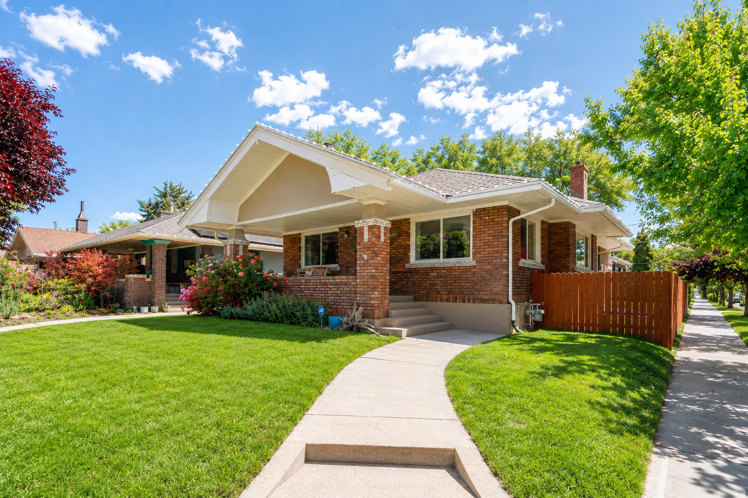 Vintage meets modern in this fully updated 1922 bungalow, featuring a rare legal Mother-in-Law apartment (ADU) with separate entrance and convenient access to shared laundry. Recent improvements include updated electrical, foundation piers for added structural stability, new sewer liner, and all the pretty finishes: carpet, paint, wallpaper, lighting, hardware, and more. The open-concept main level showcases a show-stopping dining room made for entertaining, gourmet kitchen with granite countertops, stainless steel appliances, farmhouse sink, custom tile, and flex duo oven, walnut flooring, and the rare advantage of three bedrooms on the main floor, each with its own walk-in closet. The oversized primary suite is a retreat of its own, drenched in Farrow & Ball London Clay and featuring a fireplace and sitting area. Outside, the 720-square-foot detached garage parks two vehicles or provides flexible space for a workshop, gym, or studio. Enjoy morning coffee on the front porch as dogs walk their humans by, then retreat to the shaded hammock nook with solar lighting for all-day enjoyment. The perfectly sized backyard offers room to relax without consuming your weekends, while the covered stone patio may have you choosing between hosting or declining plans in favor of staying home. Walk to Trader Joe's, Sugarhouse S-Line, Liberty Park, and to any of the dozens of restaurant nearby! Welcome Home! [Agent related to seller and has an interest in the home.]