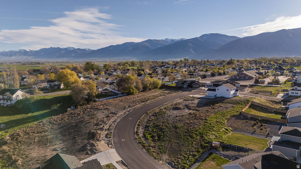 Discover Mount Sterling Farms, a scenic Hyrum community known for its breathtaking mountain views, thoughtfully planned layout, and inviting neighborhood amenities. Enjoy access to parks, a splash pad, and nearby recreation, all while being just minutes from local conveniences. With a quieter setting and plenty of space to enjoy the outdoors, this community offers a refreshing change of pace without sacrificing accessibility. Bring your vision and build your dream home that truly fits your lifestyle. Explore the many options and floor plans with our amazing Builder, or bring your own builder. Call us for more information today!
