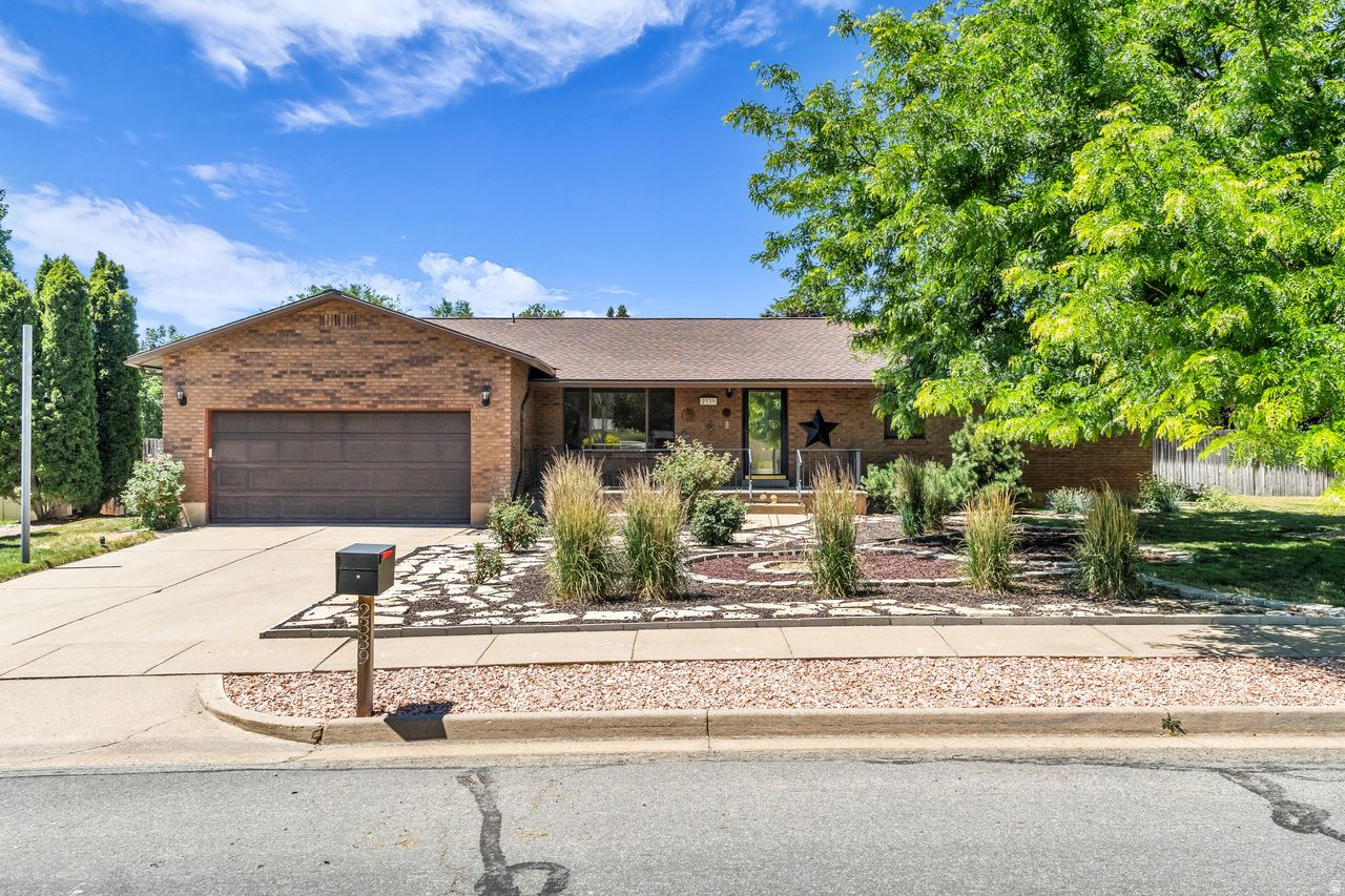 This house sits on an expansive, fully landscaped lot with attractive curb appeall. The interior features abundant natural light, gleaming hardwood flooring, and a neutral color palette that creates a cozy atmosphere. The spacious living area provides ample room for relaxation, while the primary bedroom offers a comfortable feel. The scenic mountain views visible from the property enhance the tranquil setting. Additionally, the home boasts a sauna, providing a peaceful space for relaxation and rejuvenation.  Notable upgrades include a new roof with ridge vent and a new water heater, both installed in 2025, along with dual-pane windows and a relaxing basement sauna.