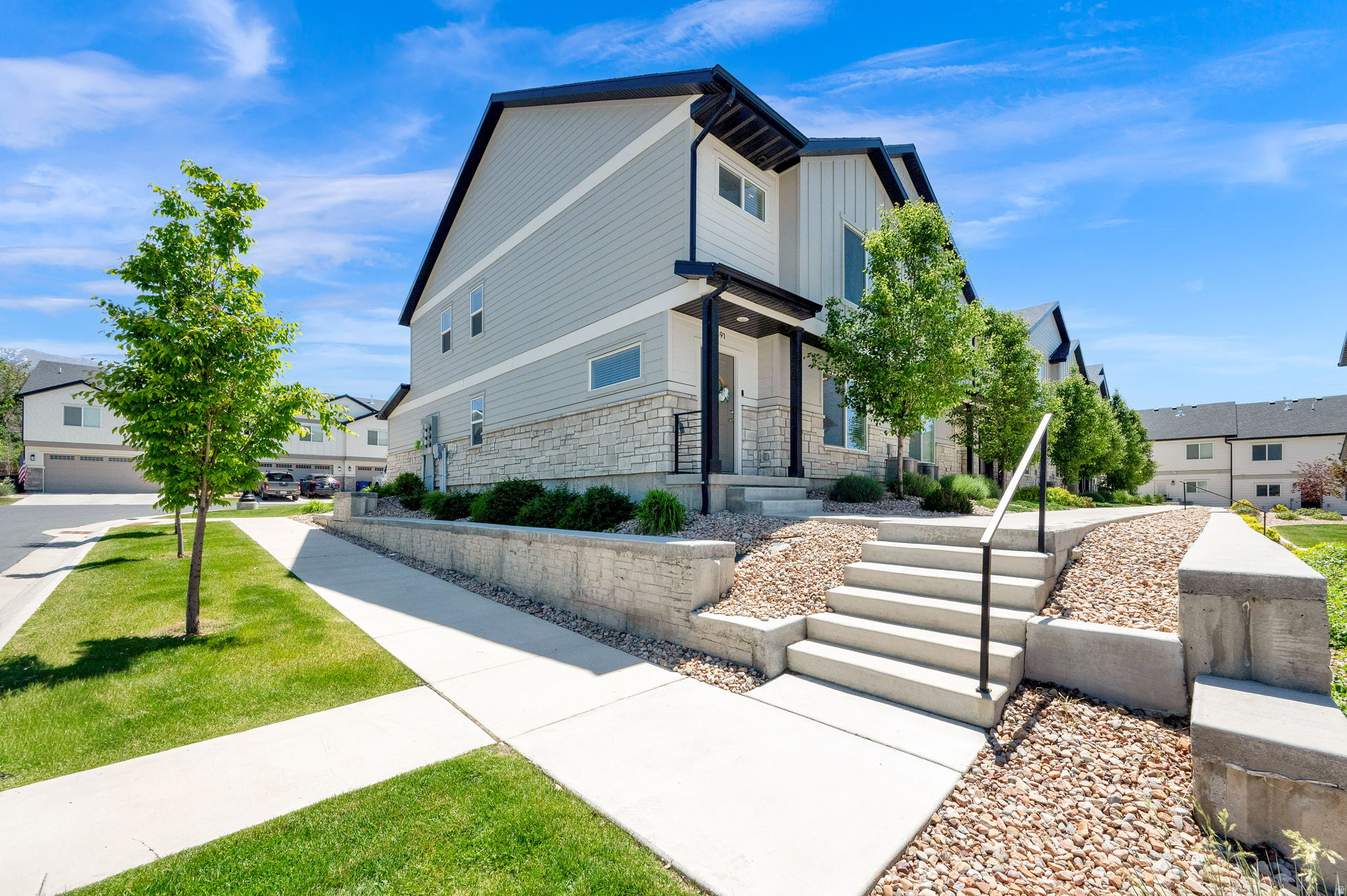 Upgraded END-UNIT townhome with stunning mountain views and unbeatable location in a quiet community with lots of green space! This move-in ready 3-bedroom home features a bright open-concept floor plan with stylish gray cabinetry, sleek black hardware, and gorgeous white quartz countertops throughout. You won't find this spacious primary suite anywhere else- it offers a spa-like retreat with a deep soaking tub, separate shower, double sinks and walk-in closet. Additional highlights include a X-large laundry room, two-car garage with extra storage space and a water spigot for added convenience. Enjoy ultra-fast 1 to 10 Gbps fiber internet. Conveniently situated just minutes from shopping, freeway access, and nearby parks including Legacy Farms Park. Modern upgraded finishes, incredible connectivity, scenic views, and a prime location make this home a must-see!